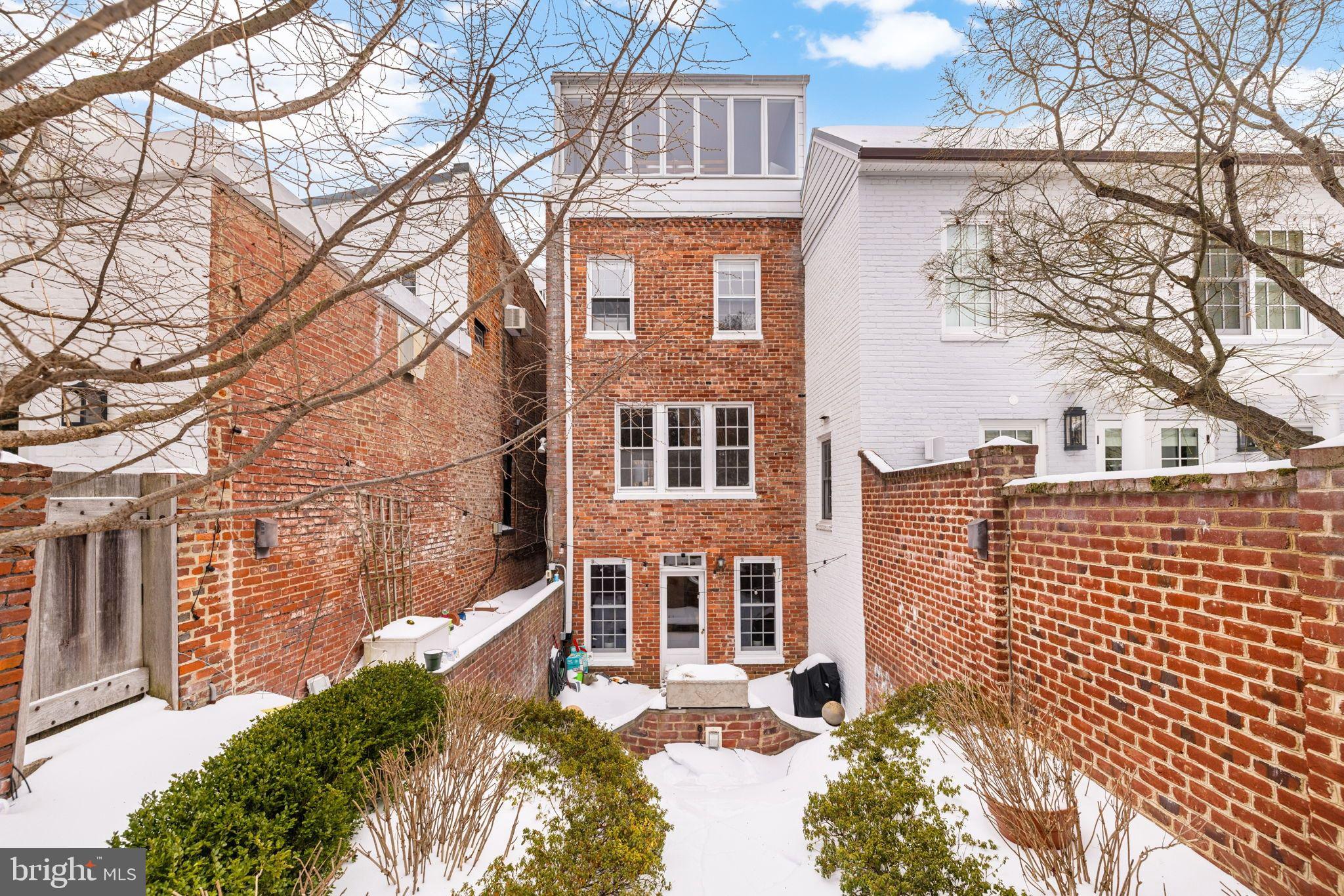 3127 O Street Northwest Washington, DC 20007 - Photo 10 of 11 front view of a house with a yard