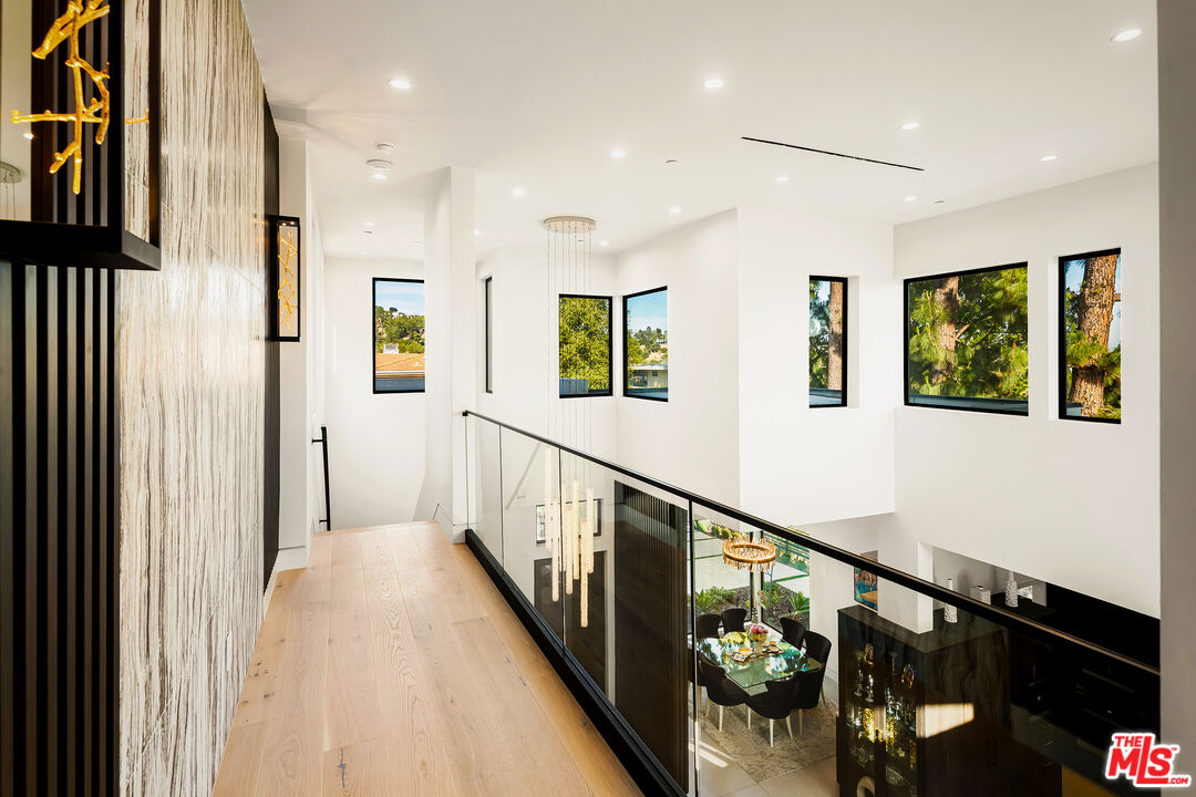 1367 Casiano Road Los Angeles, CA 90049 - Photo 18 of 26 a view of hallway with stairs
