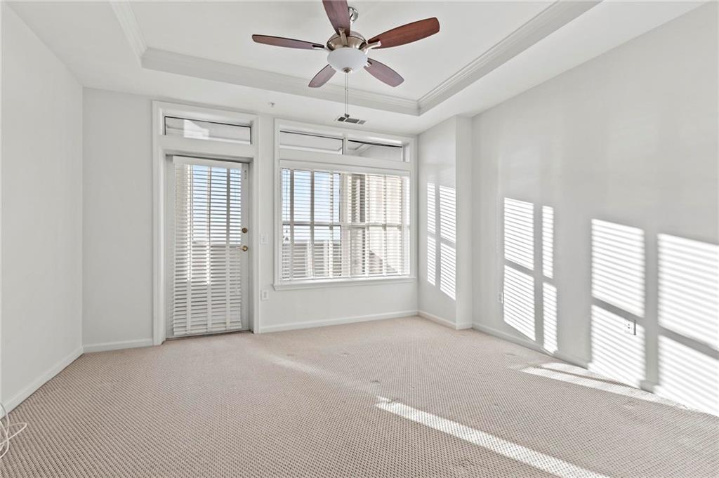 3334 Peachtree Road Northeast, Unit 1207 Atlanta, GA 30326 - Photo 15 of 31 a view of an empty room with a window