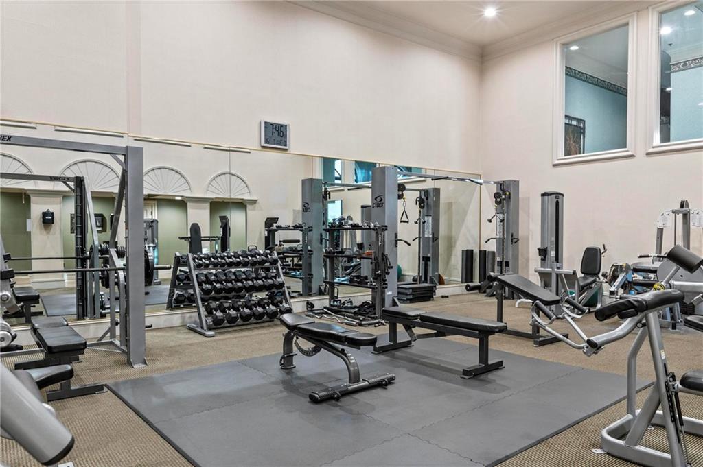 3334 Peachtree Road Northeast, Unit 1207 Atlanta, GA 30326 - Photo 23 of 31 a view of a room with gym equipment