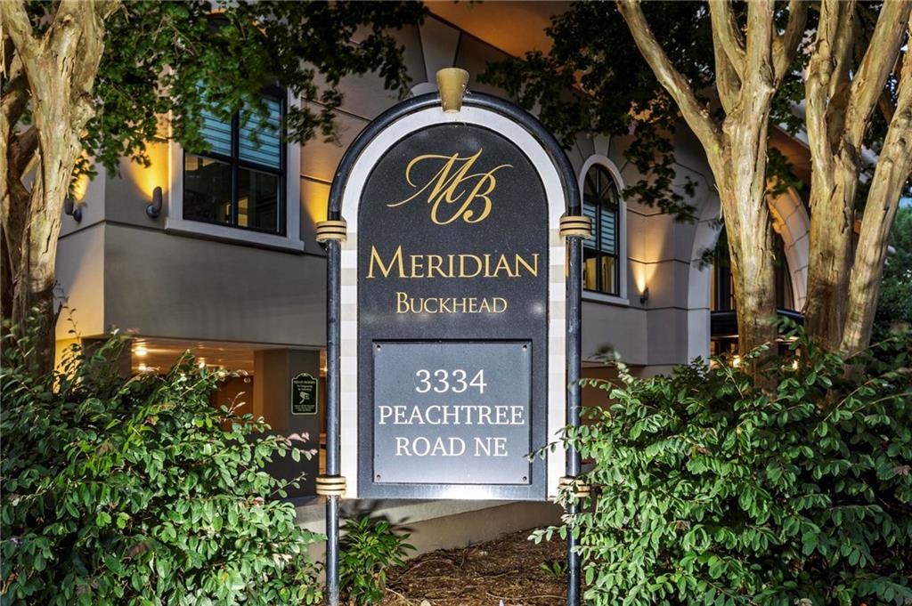 3334 Peachtree Road Northeast, Unit 1207 Atlanta, GA 30326 - Photo 31 of 31 a sign that is on a pole