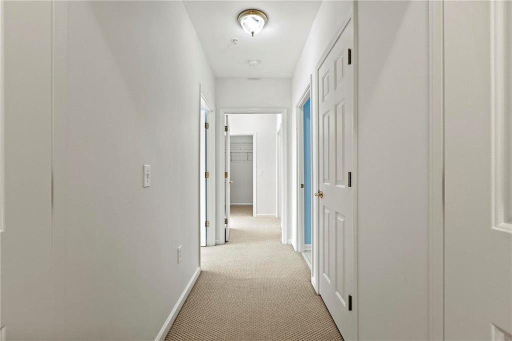 3334 Peachtree Road Northeast, Unit 1207 Atlanta, GA 30326 - Photo 10 of 31 a view of a hallway