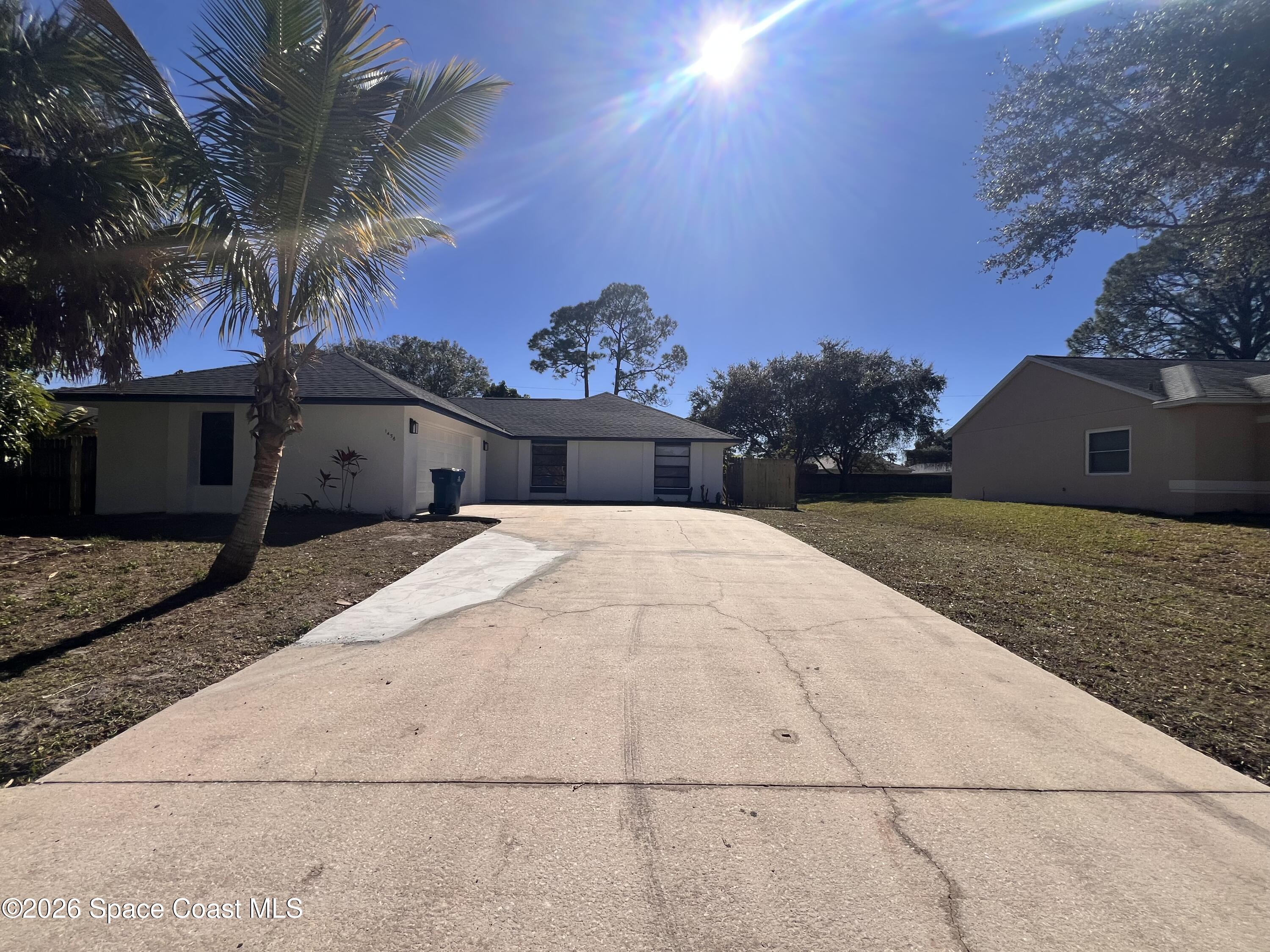 a view of an house with backyard space