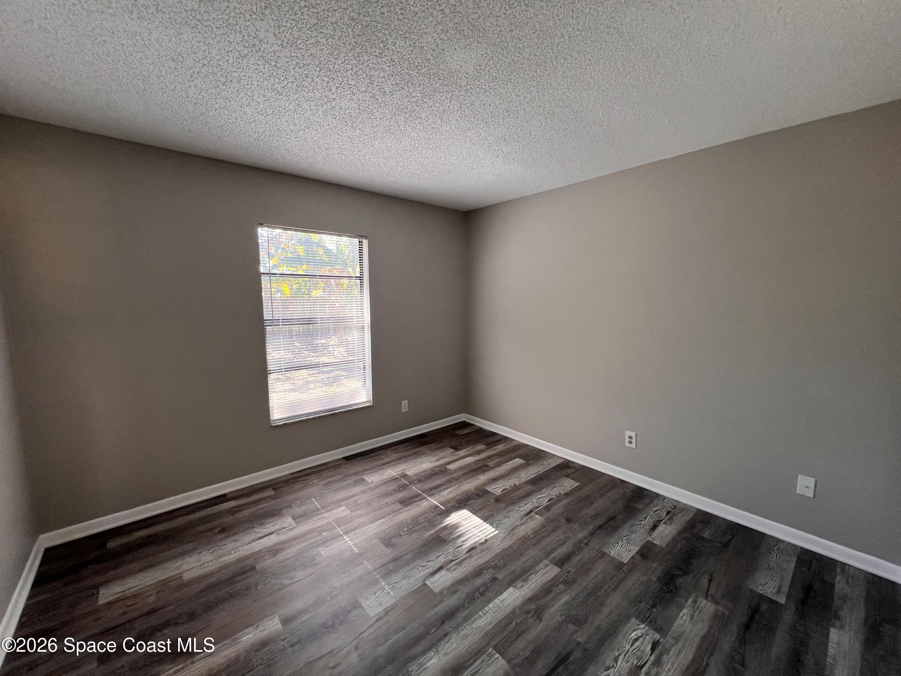 1456 Reed Street Northwest Palm Bay, FL 32907 - Photo 13 of 19 a view of room and window