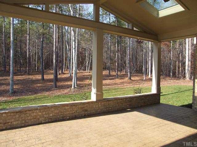 5136 Terra Cotta Drive Raleigh, NC 27613 - Photo 12 of 12 a view of backyard with green space