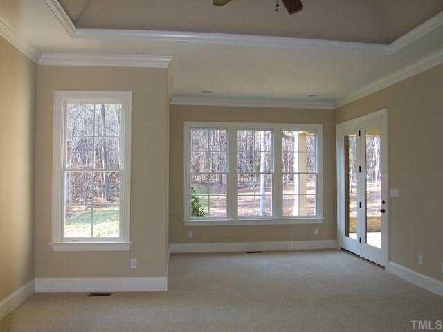 5136 Terra Cotta Drive Raleigh, NC 27613 - Photo 8 of 12 a view of an empty room with a window