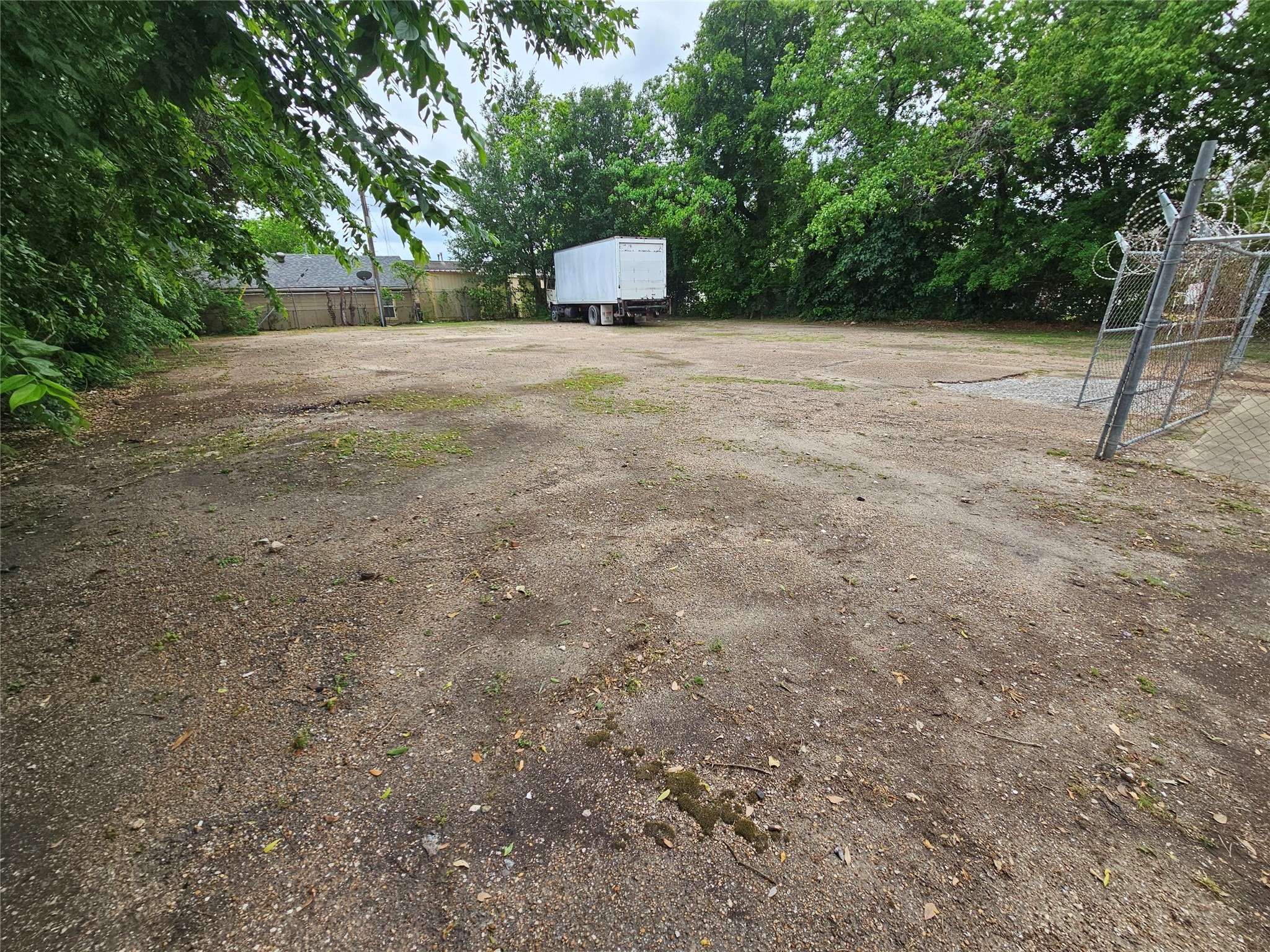 3330 Kilgore Street Houston, TX 77021 - Photo 5 of 8 a wooden bench sitting in middle of a yard