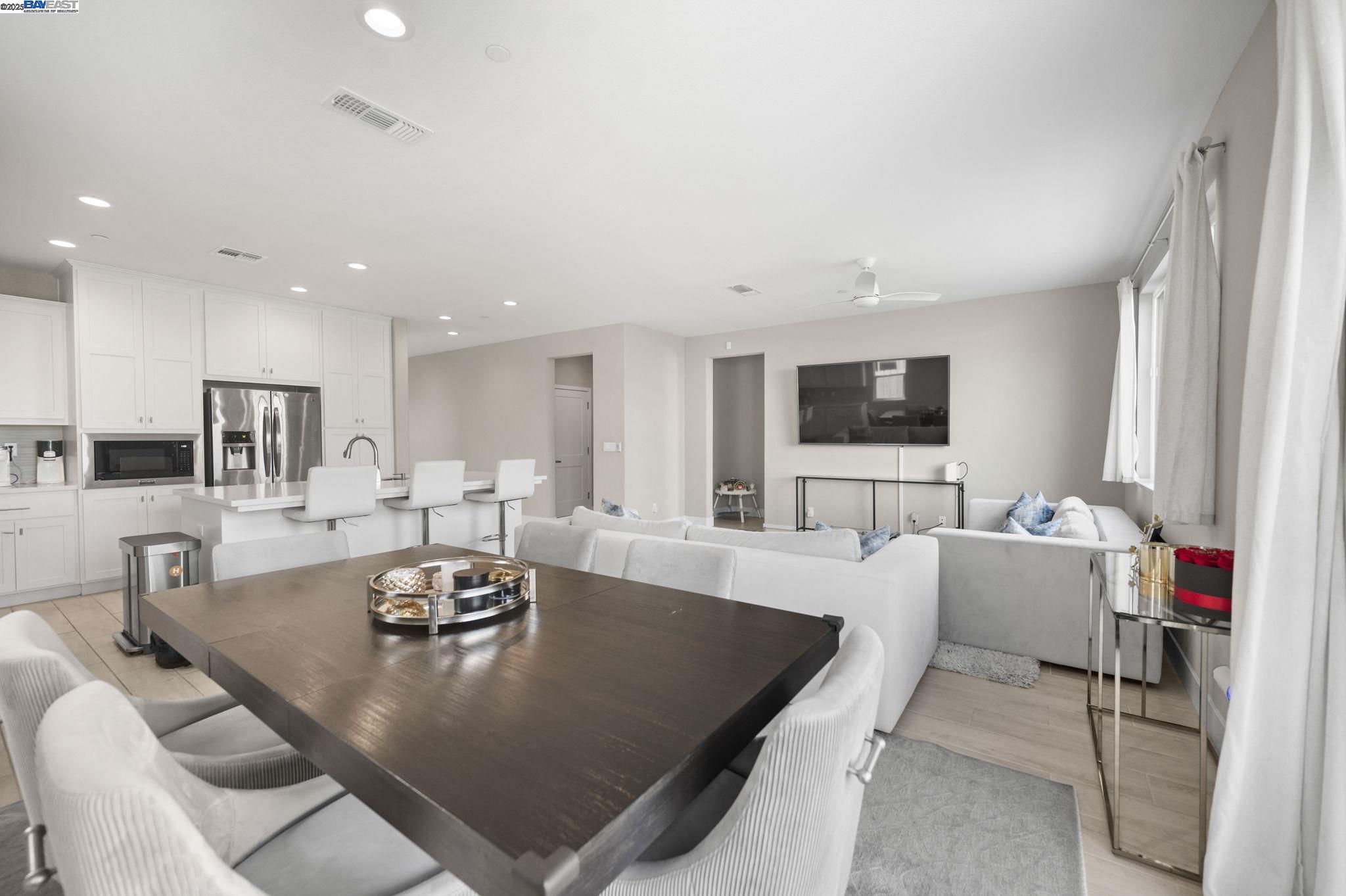 1605 Radiance Lane Modesto, CA 95356 - Photo 12 of 35 a living room with furniture and a flat screen tv