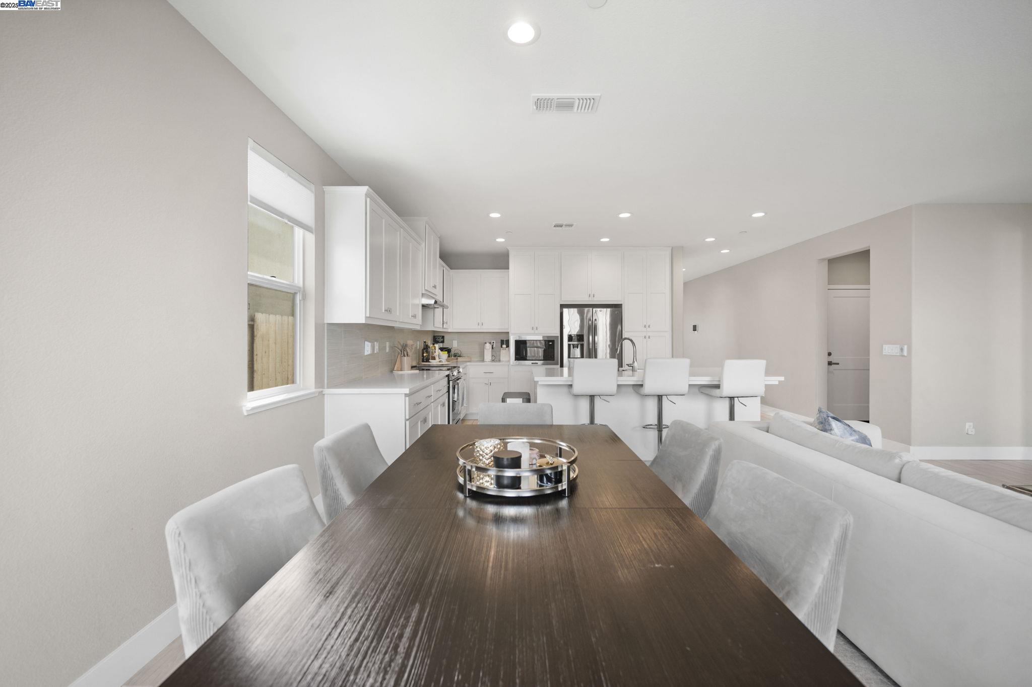 1605 Radiance Lane Modesto, CA 95356 - Photo 13 of 35 a living room with furniture and kitchen view