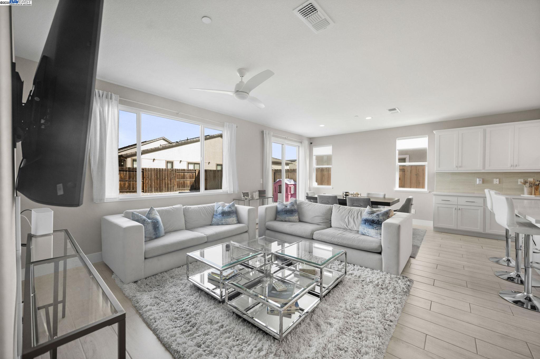 1605 Radiance Lane Modesto, CA 95356 - Photo 14 of 35 a living room with furniture a rug and a window