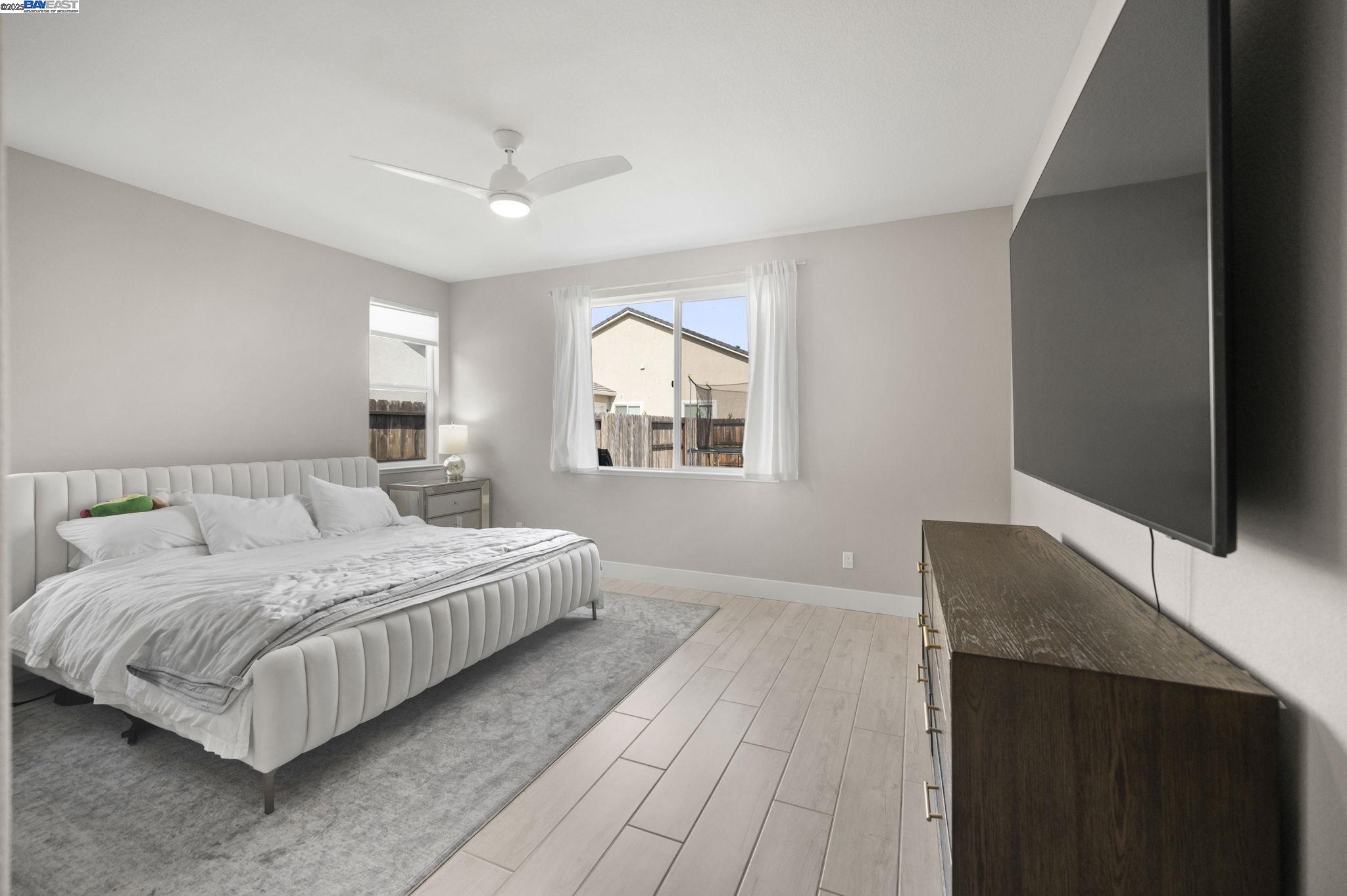 1605 Radiance Lane Modesto, CA 95356 - Photo 17 of 35 a bedroom with double bed and a window