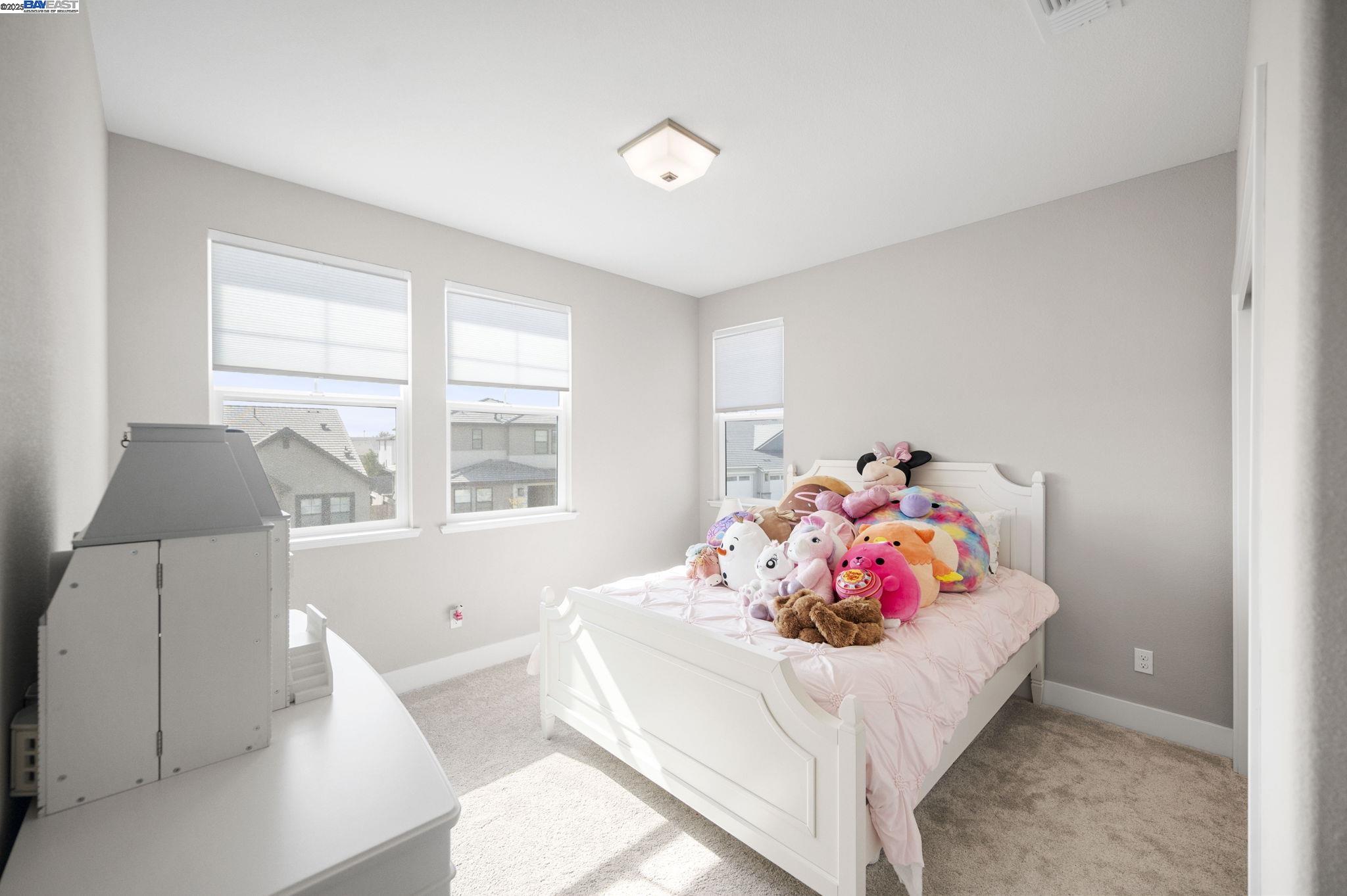 1605 Radiance Lane Modesto, CA 95356 - Photo 25 of 35 a living room with furniture and a table