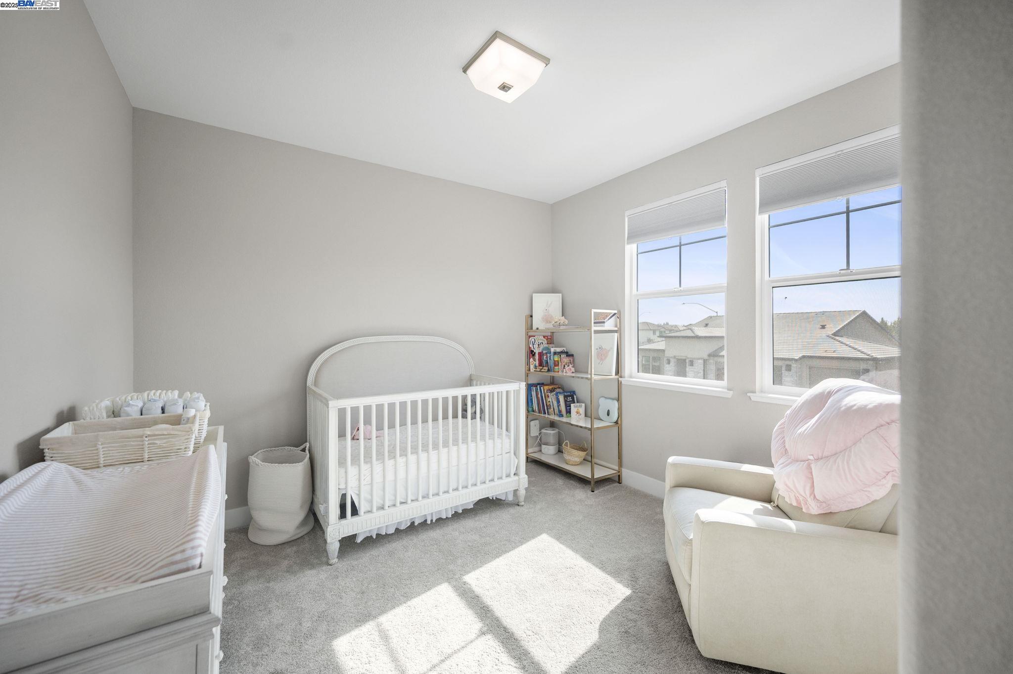1605 Radiance Lane Modesto, CA 95356 - Photo 28 of 35 a living room with furniture and a window
