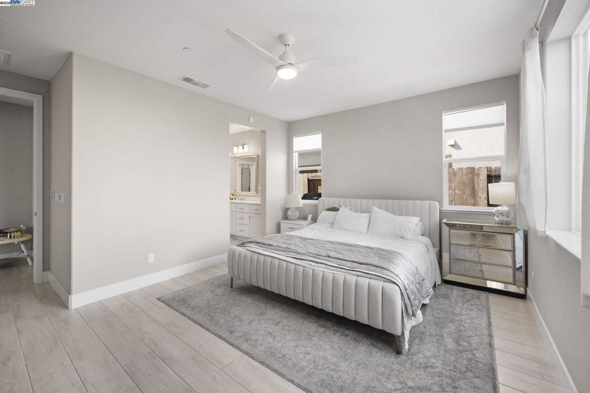 1605 Radiance Lane Modesto, CA 95356 - Photo 4 of 35 a bedroom with a bed and closet