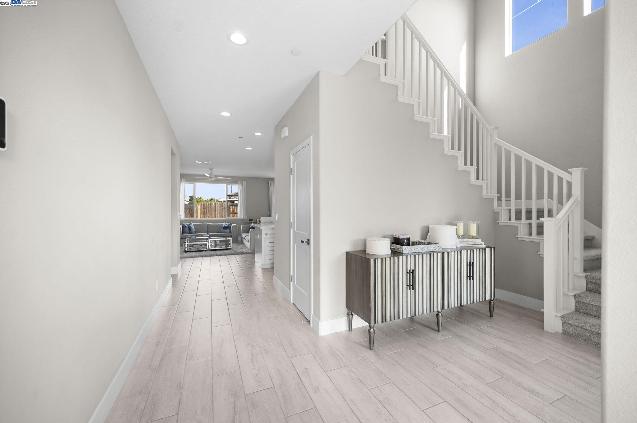 1605 Radiance Lane Modesto, CA 95356 - Photo 8 of 35 a view of hallway with wooden floor
