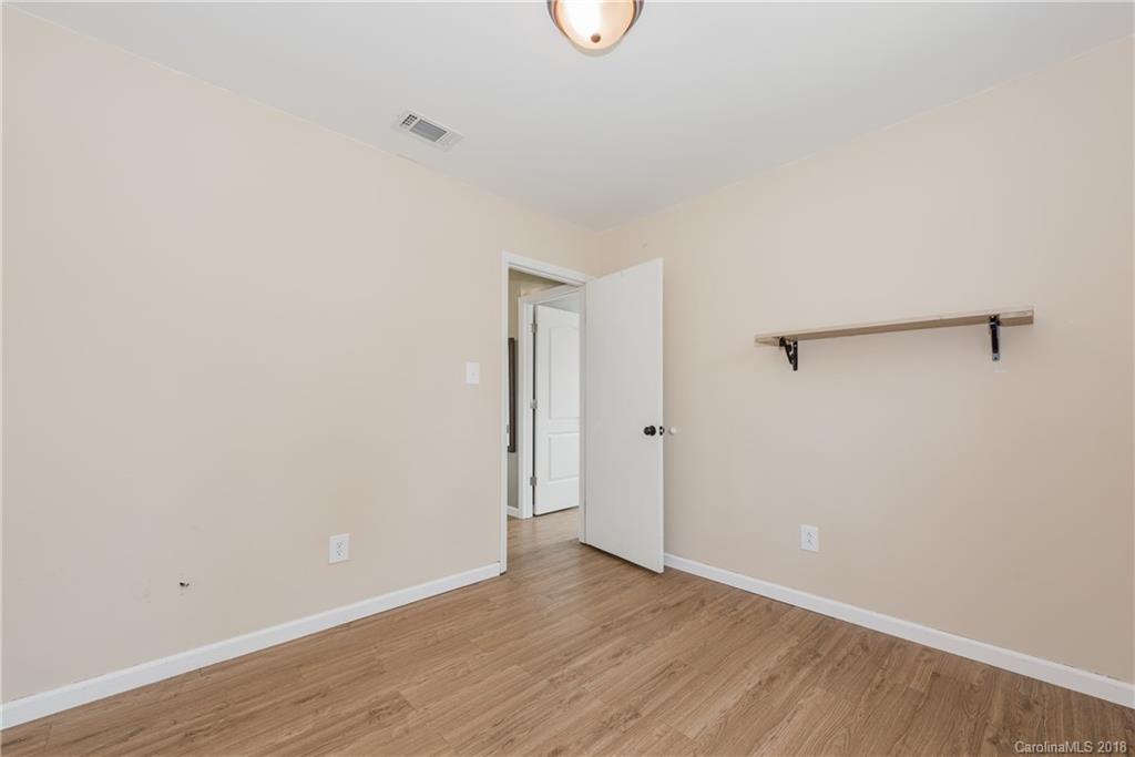 8002 Wynnview Road Indian Trail, NC 28079 - Photo 19 of 24 a view of a room with wooden floor