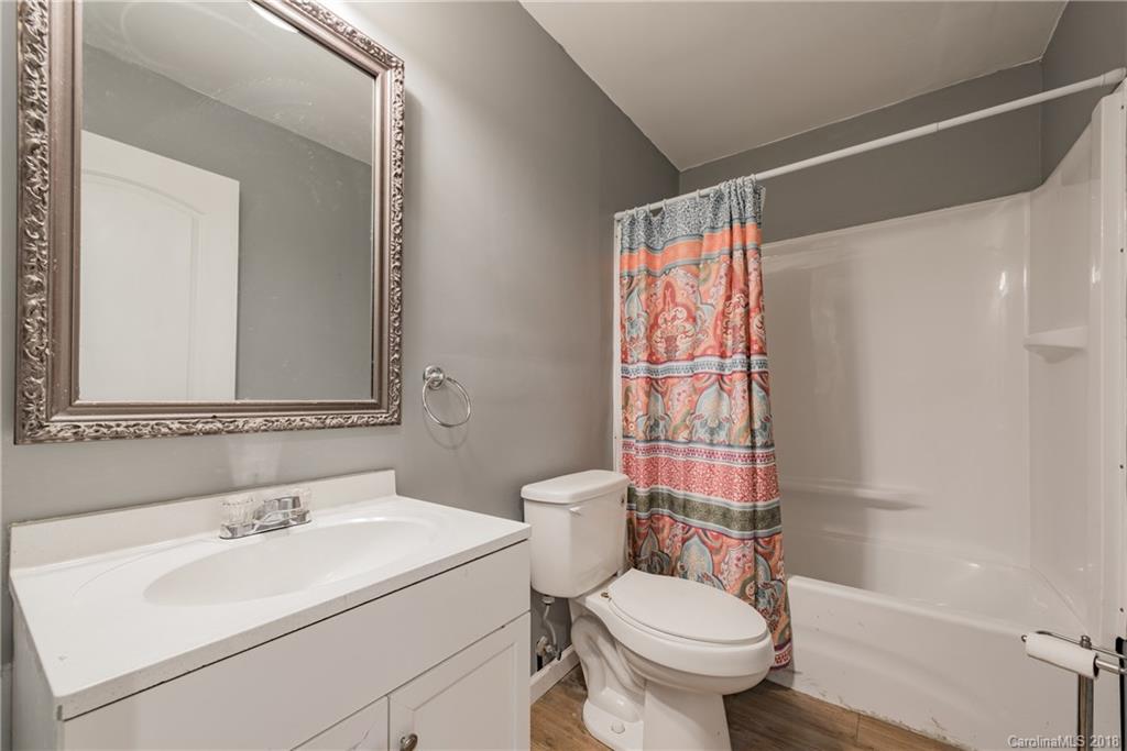 8002 Wynnview Road Indian Trail, NC 28079 - Photo 20 of 24 a bathroom with a sink toilet and shower