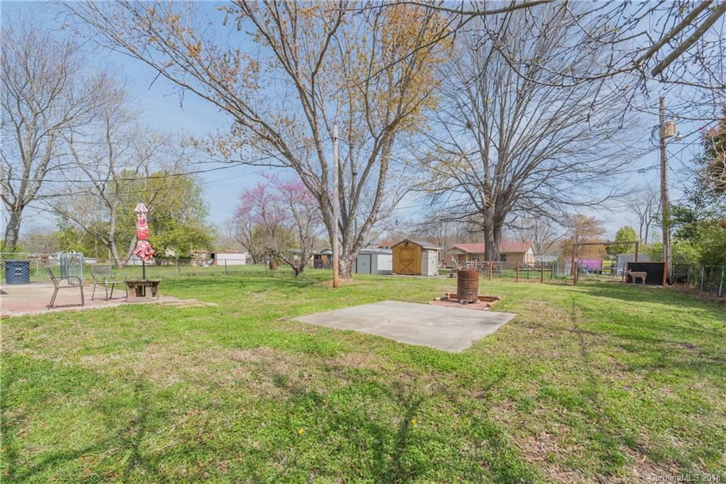 8002 Wynnview Road Indian Trail, NC 28079 - Photo 22 of 24 a fire hydrant in the middle of a field