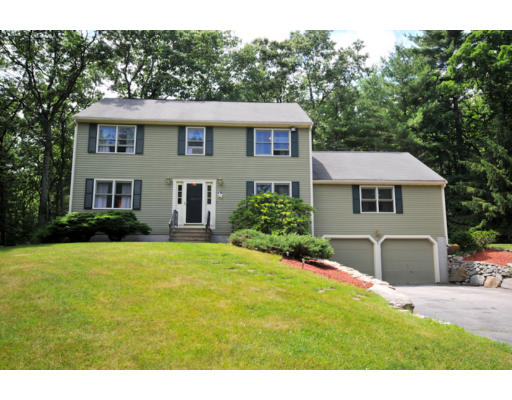 407 Moon Hill Road Northbridge, MA 01534 - Photo 1 of 1 a front view of a house with a yard