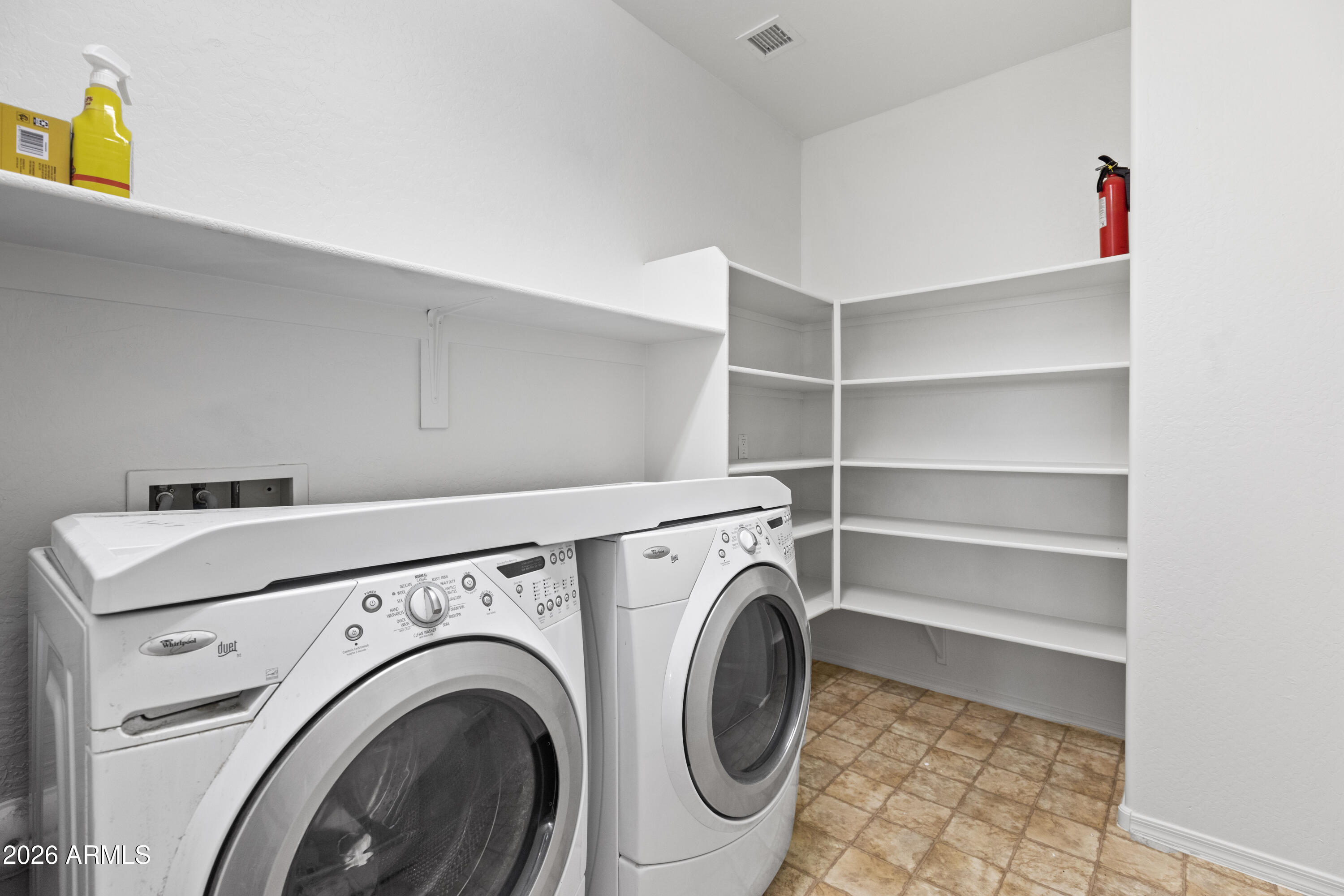 9840 Tangerine Road Florence, AZ 85132 - Photo 32 of 38 a utility room with dryer and washer
