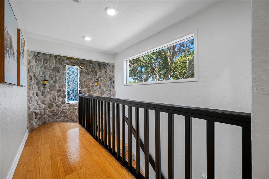 2153 Karan Way Clearwater, FL 33763 - Photo 25 of 65 a view of balcony with wooden floor