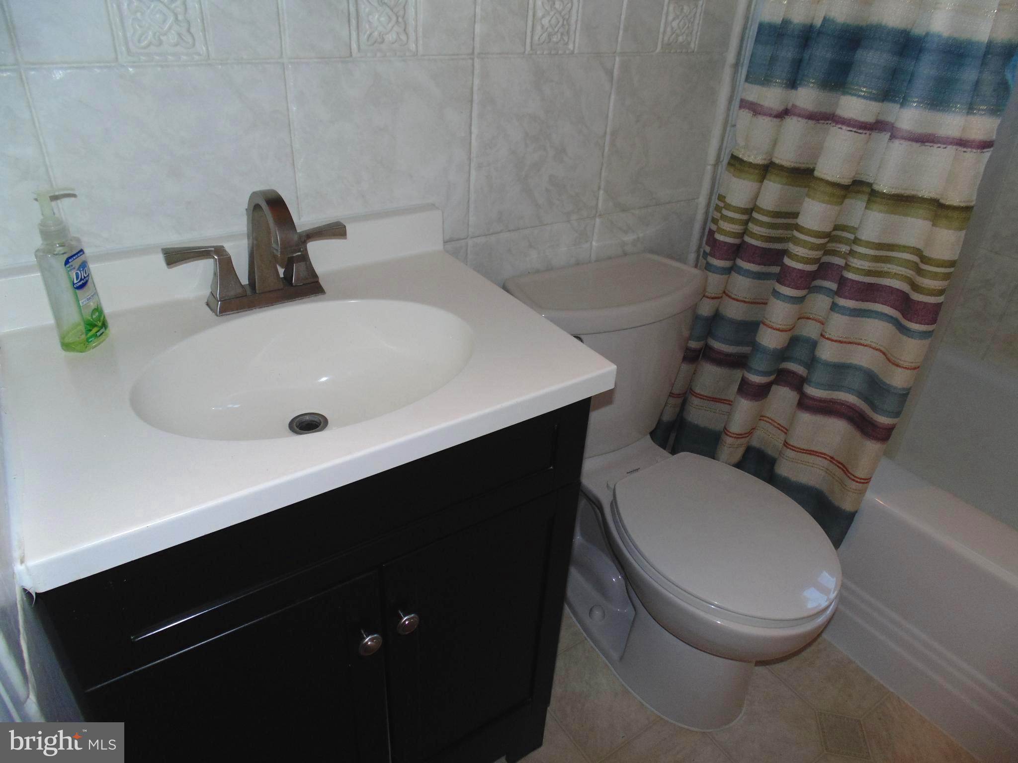 617 Middlesex Road Baltimore, MD 21221 - Photo 14 of 30 Remodeled Full Bathroom