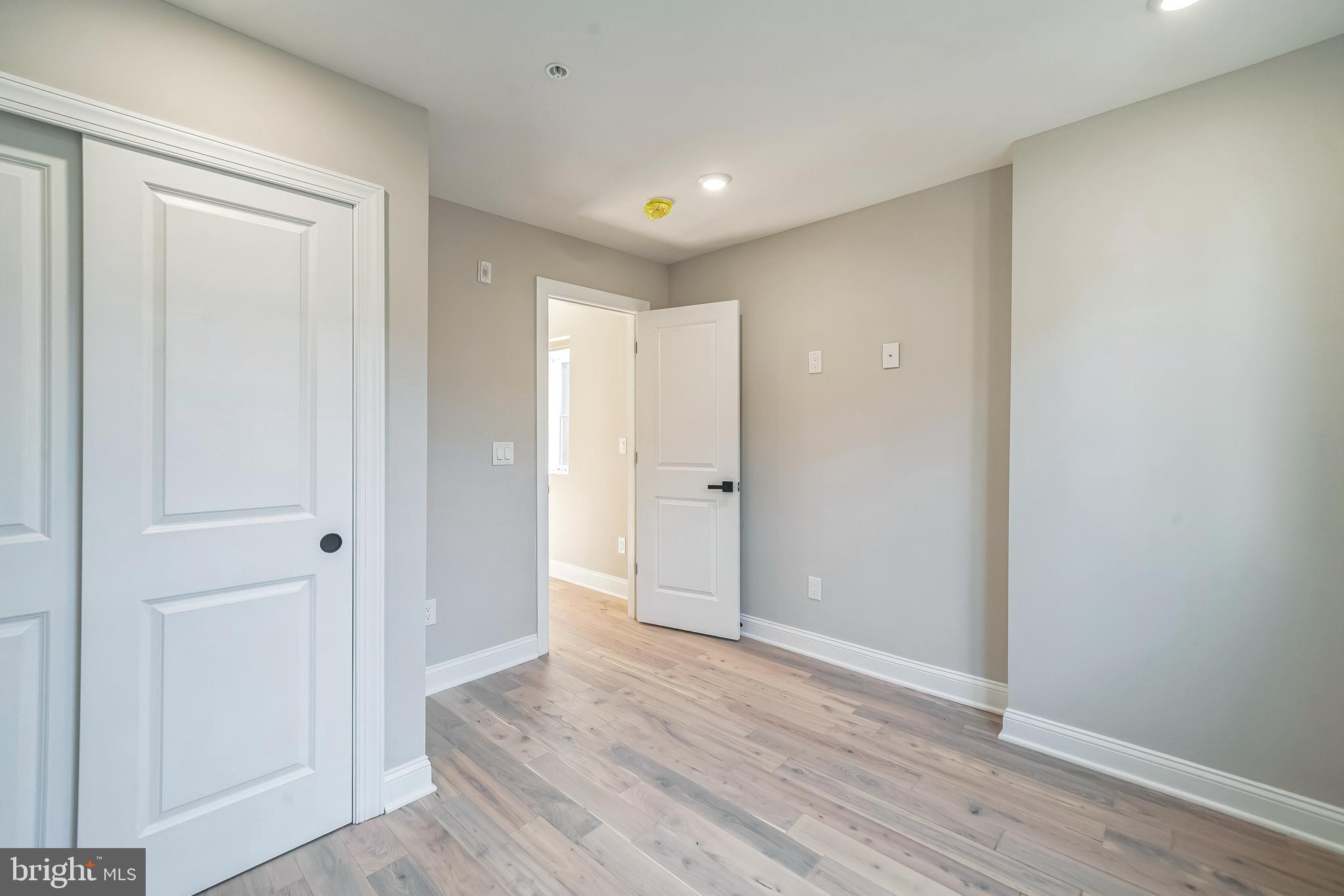 1702 South 22nd Street, Unit 3 Philadelphia, PA 19145 - Photo 15 of 22 a view of hallway with wooden floor