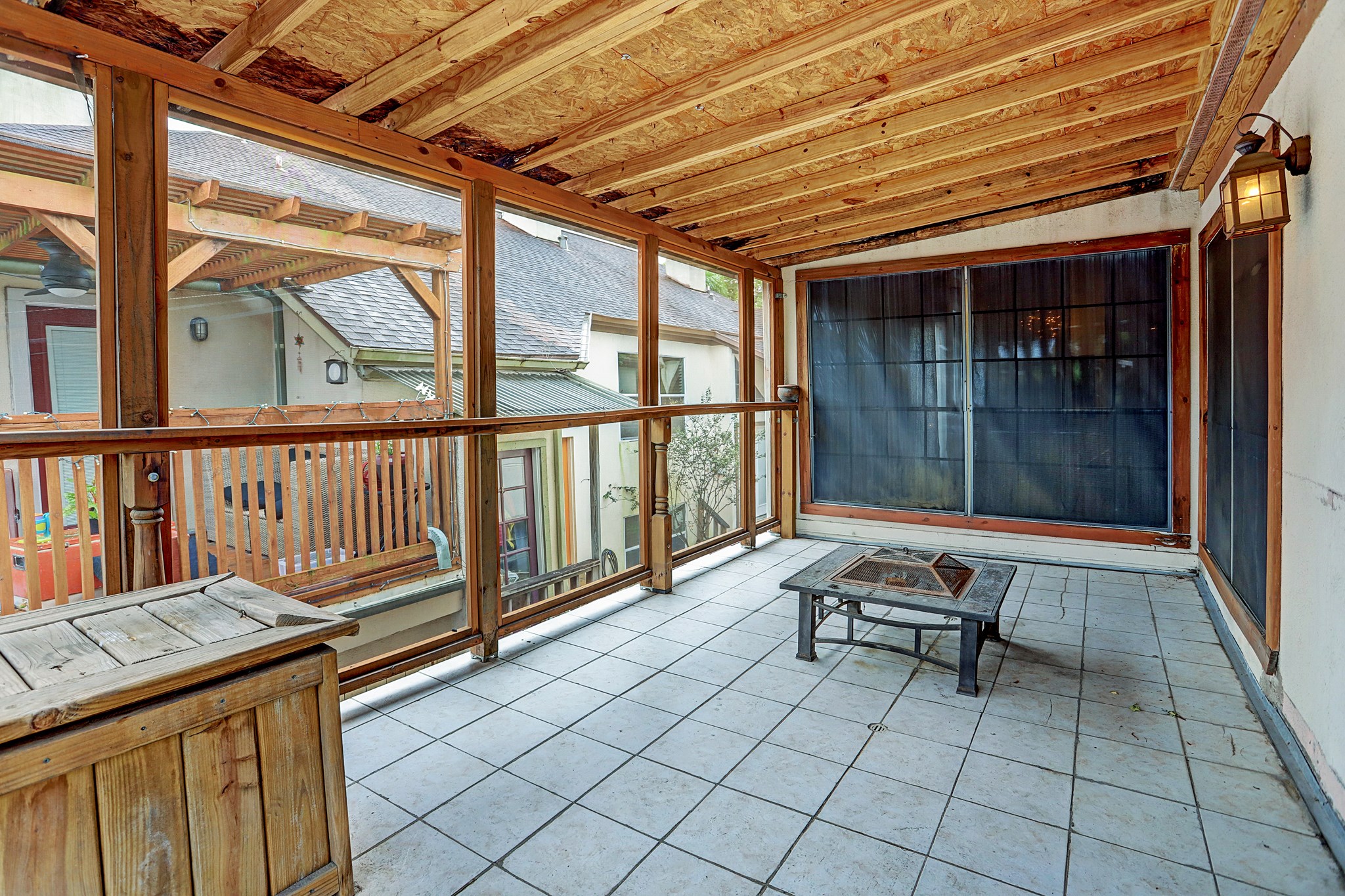 4320 Hazard Street Houston, TX 77098 - Photo 13 of 24 a balcony with chairs and glass door