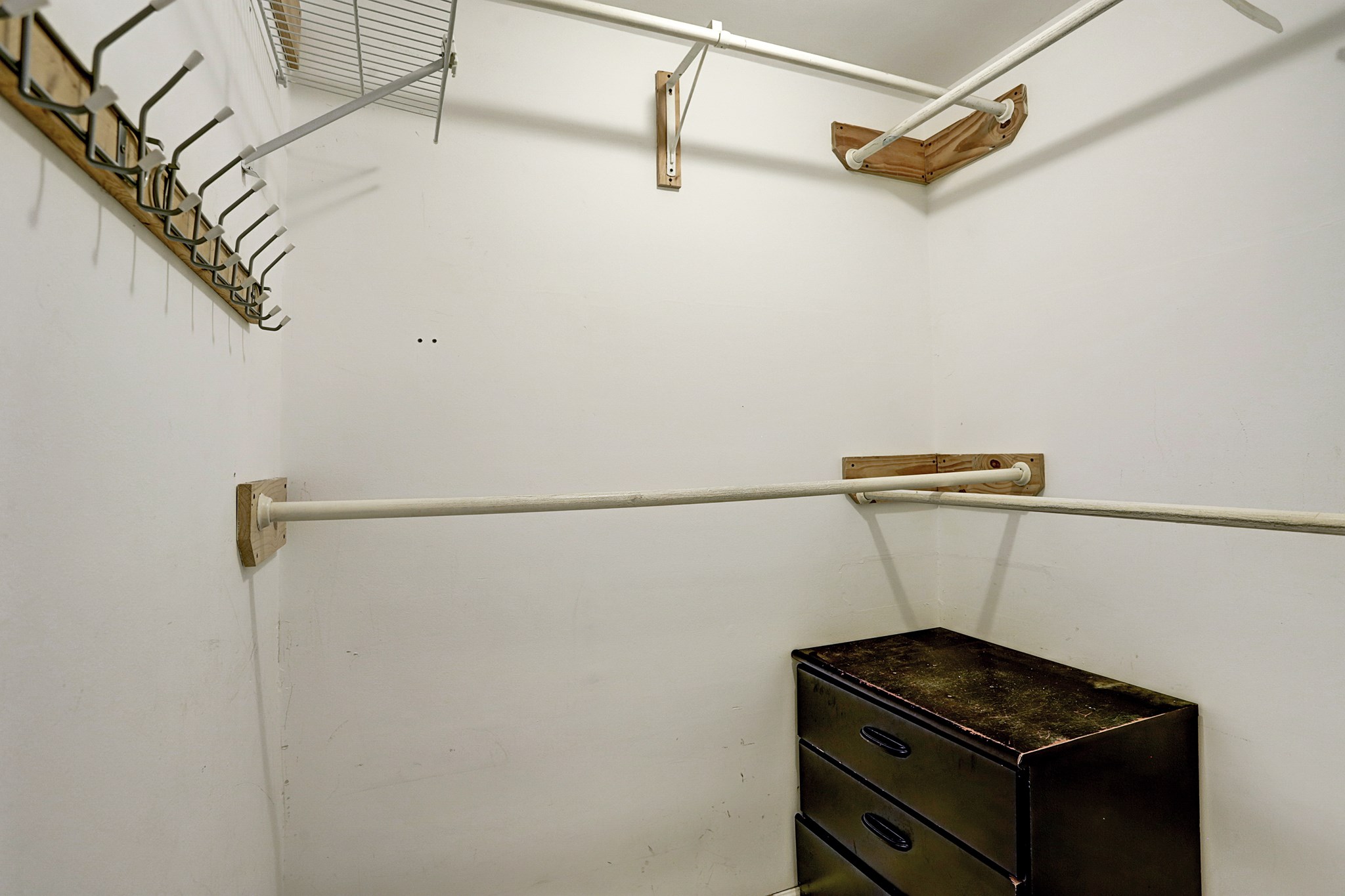 4320 Hazard Street Houston, TX 77098 - Photo 18 of 24 a view of storage and utility room with racks on the wall