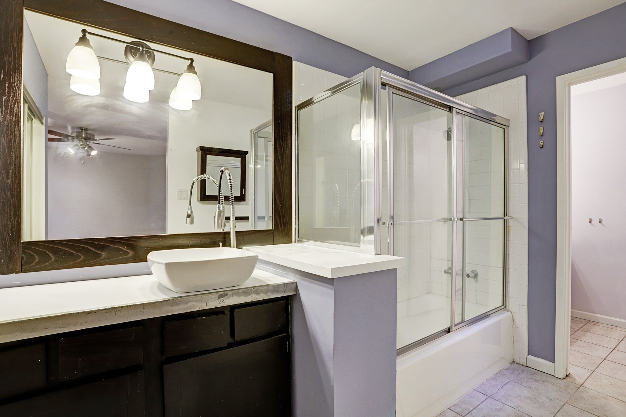 4320 Hazard Street Houston, TX 77098 - Photo 20 of 24 a bathroom with a sink and a mirror