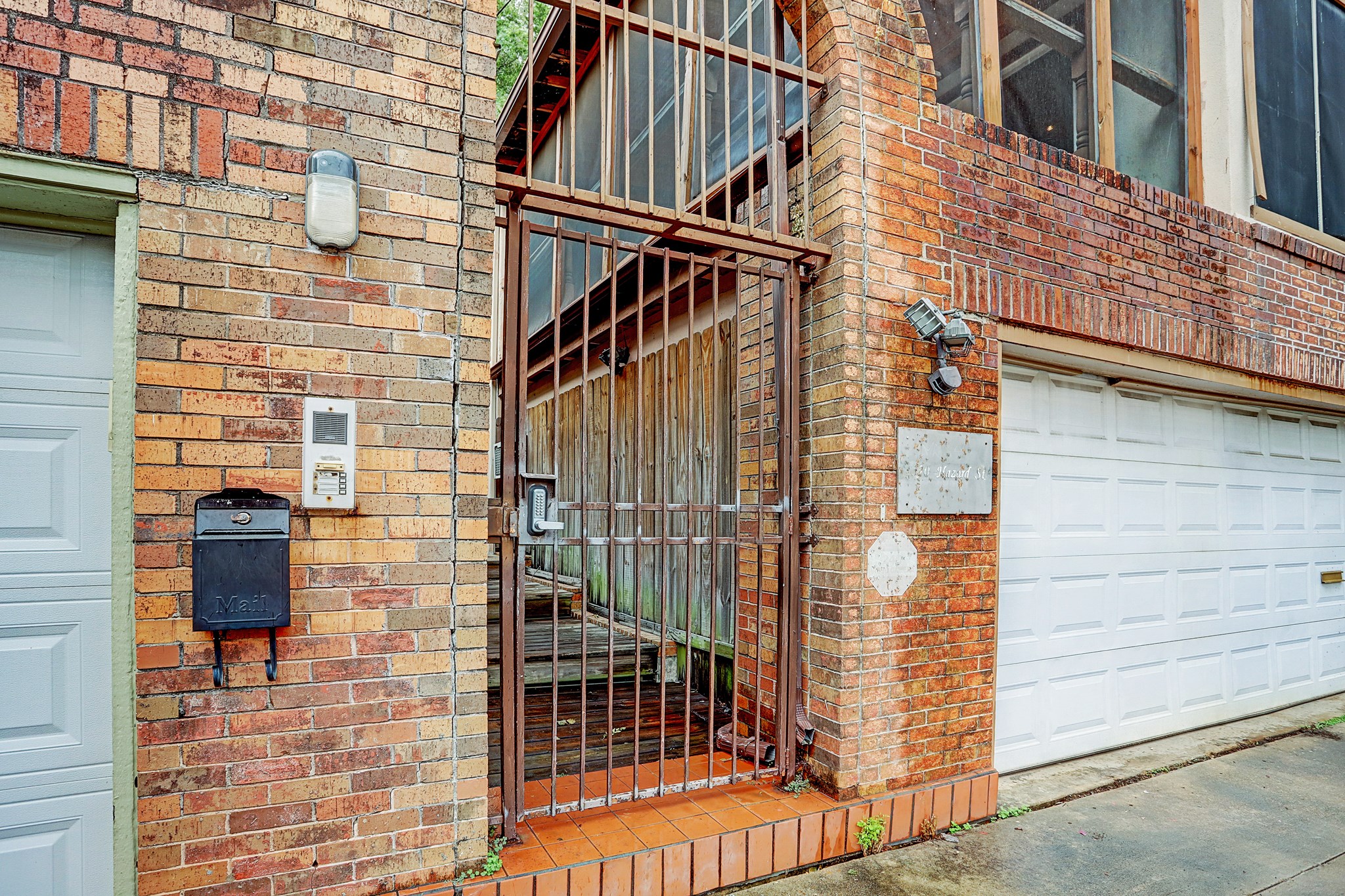 4320 Hazard Street Houston, TX 77098 - Photo 2 of 24 a view of front door of house with wooden stairs