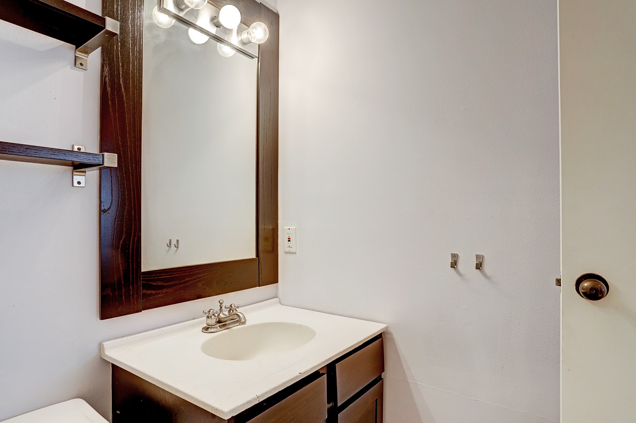 4320 Hazard Street Houston, TX 77098 - Photo 21 of 24 a bathroom with a sink and a mirror