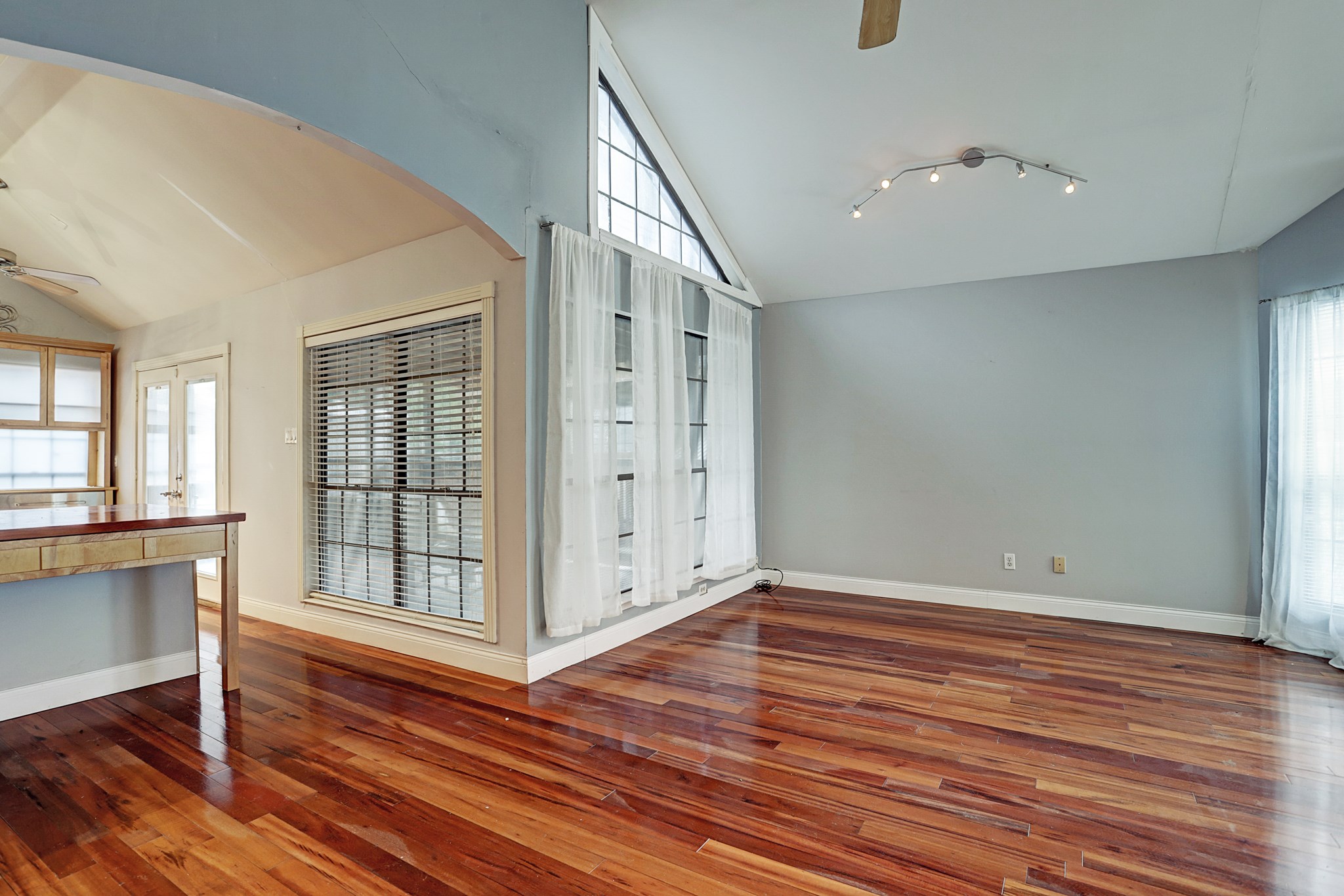 4320 Hazard Street Houston, TX 77098 - Photo 9 of 24 wooden floor in an empty room with a window