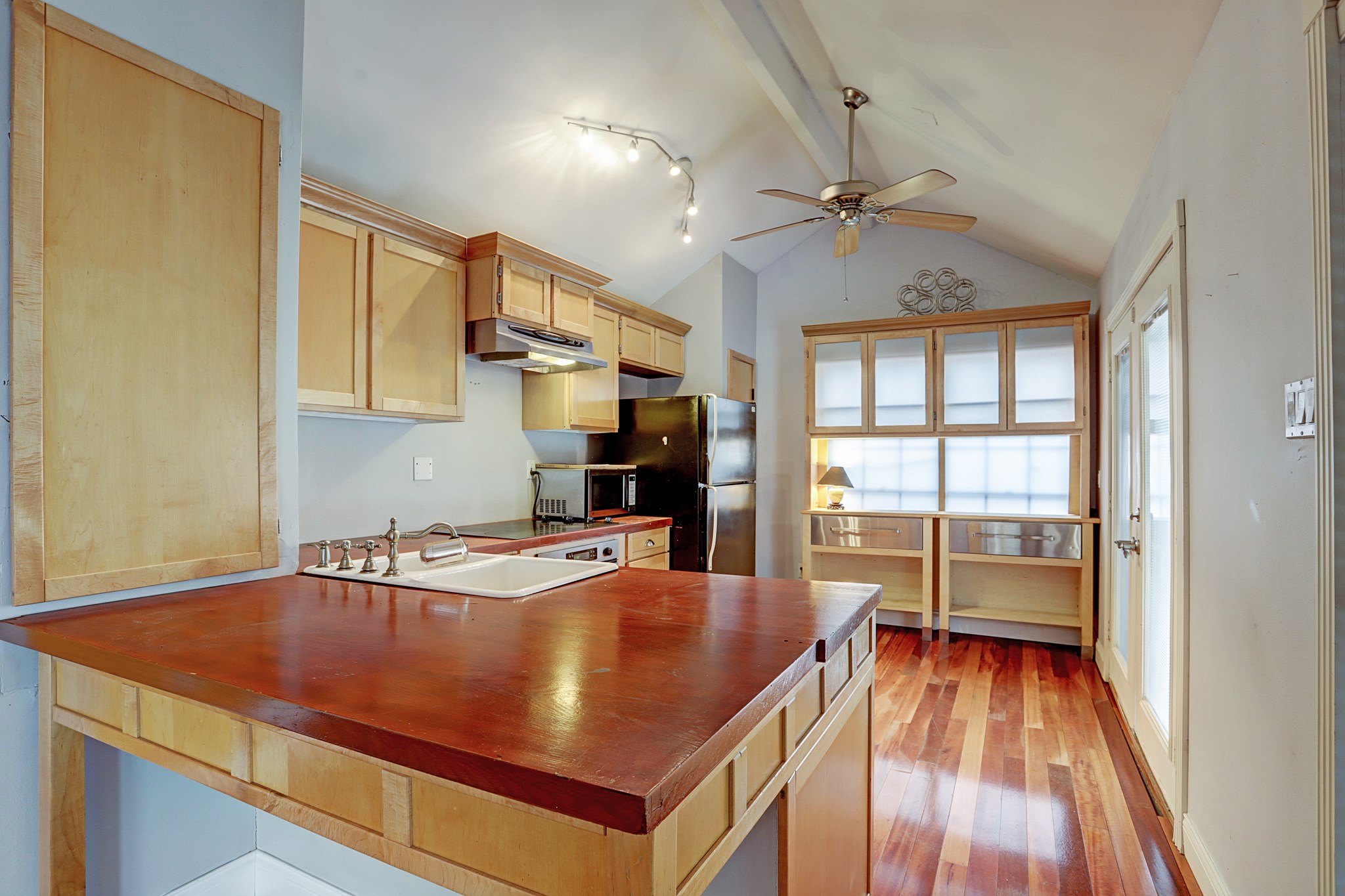 4320 Hazard Street Houston, TX 77098 - Photo 10 of 24 a room with wooden floor table and chairs