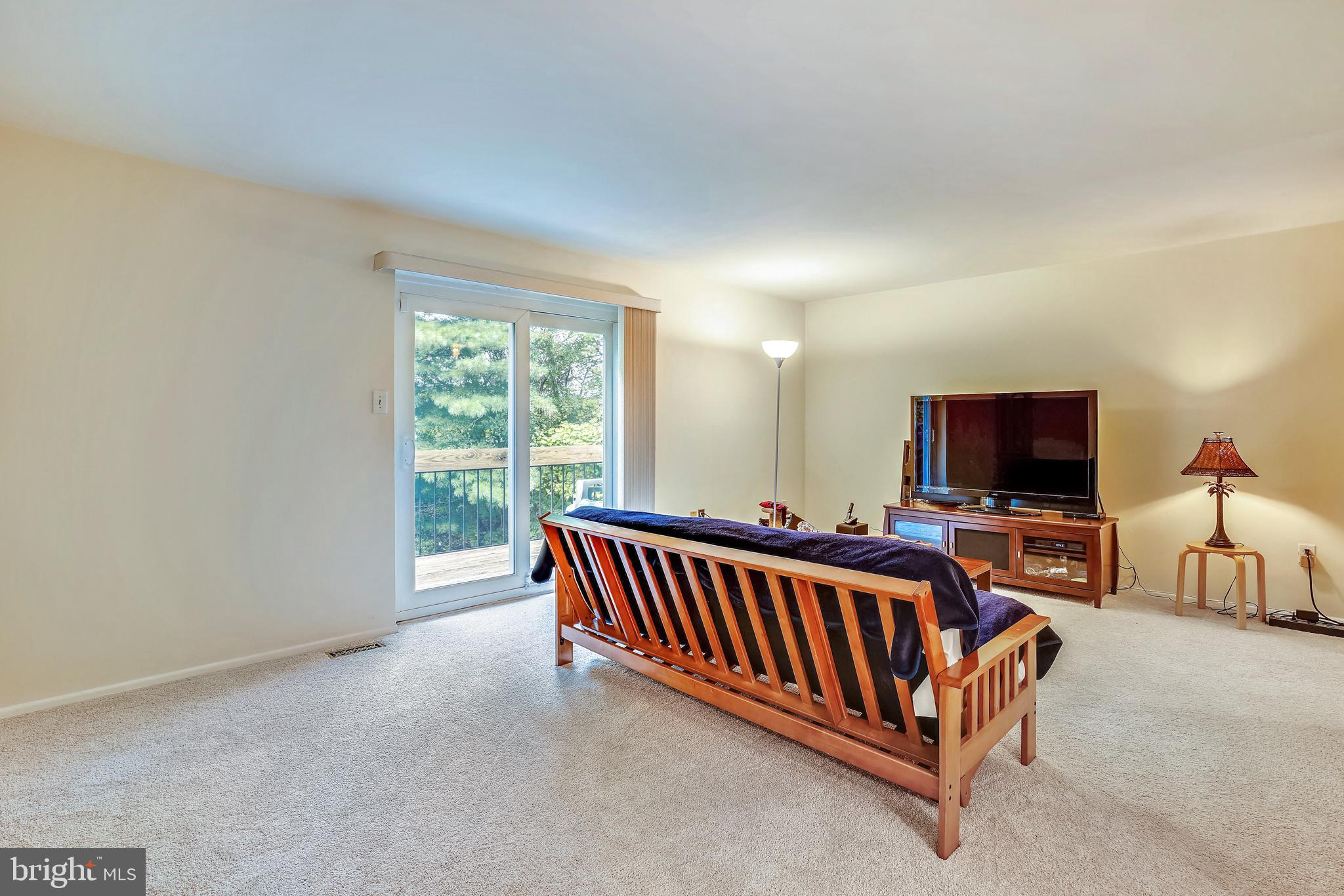 9753 Early Spring Way Columbia, MD 21046 - Photo 13 of 29 large living area that walks out to deck