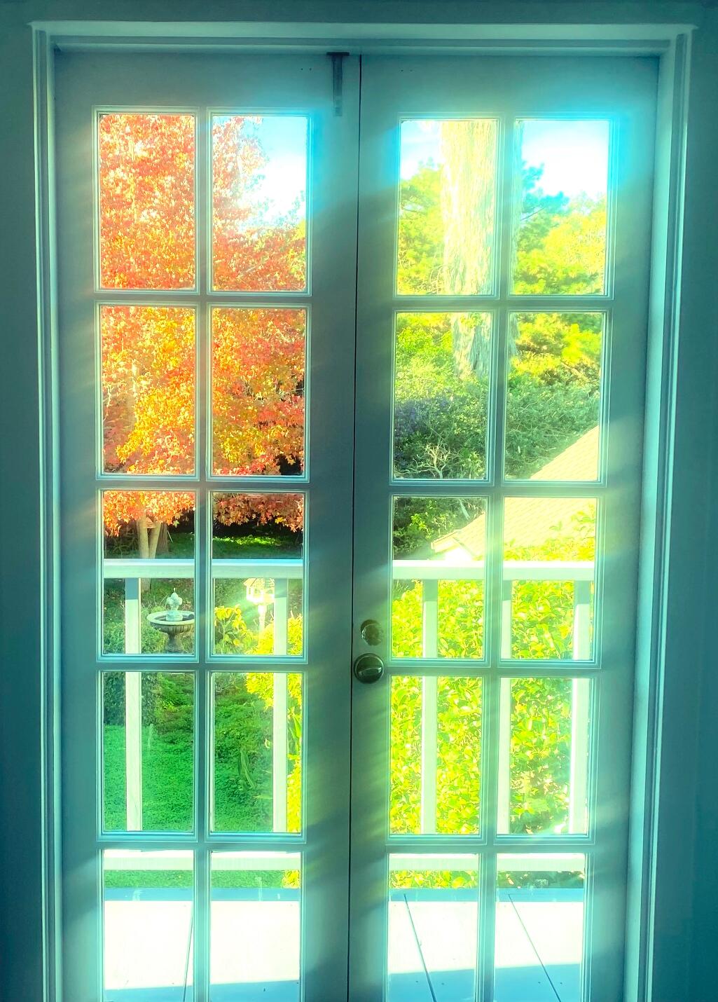 324 Arden Road Santa Barbara, CA 93105 - Photo 11 of 17 a view of an empty room with a large window and doors