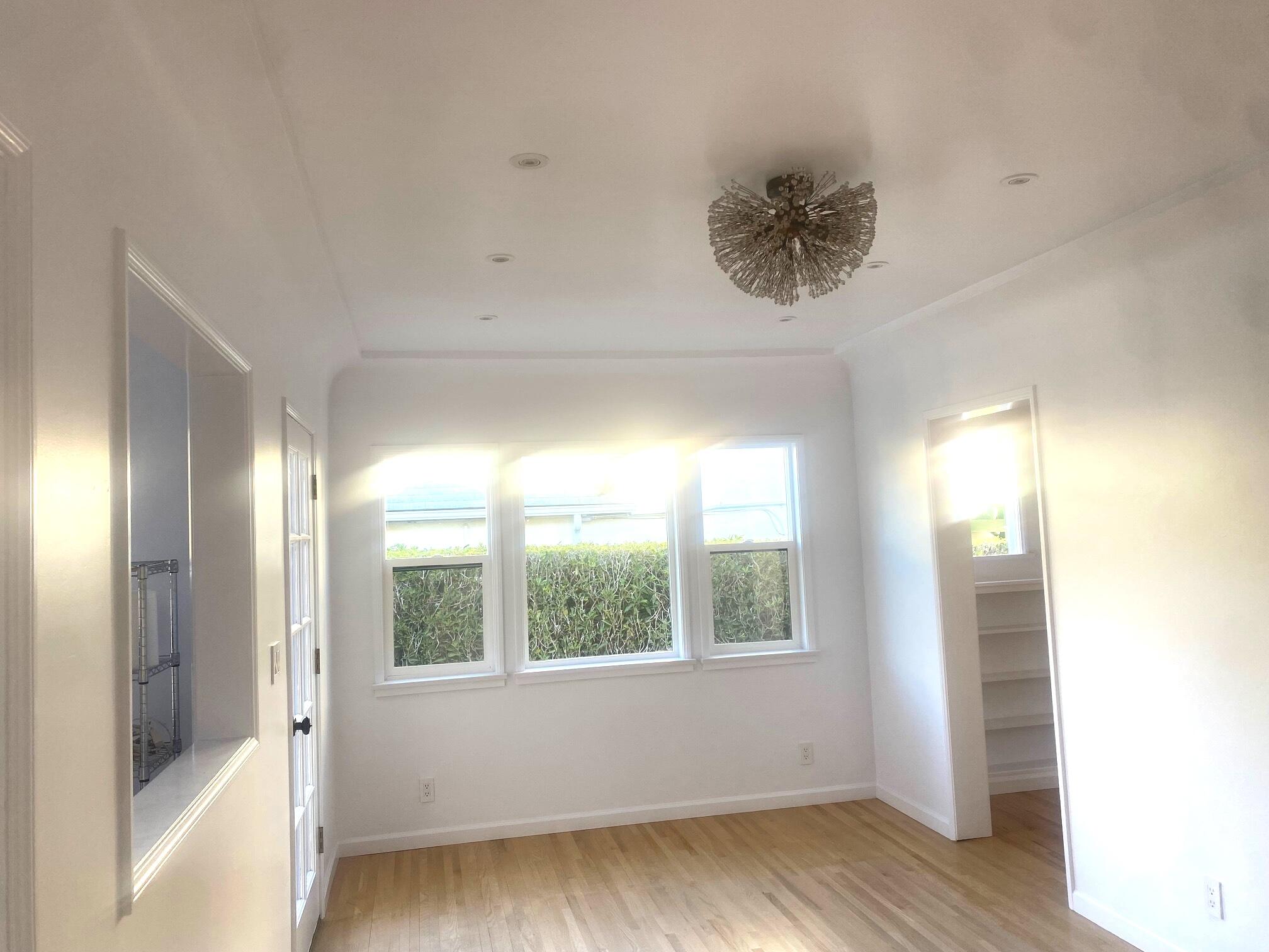324 Arden Road Santa Barbara, CA 93105 - Photo 5 of 17 a view of wooden floor and windows in a room