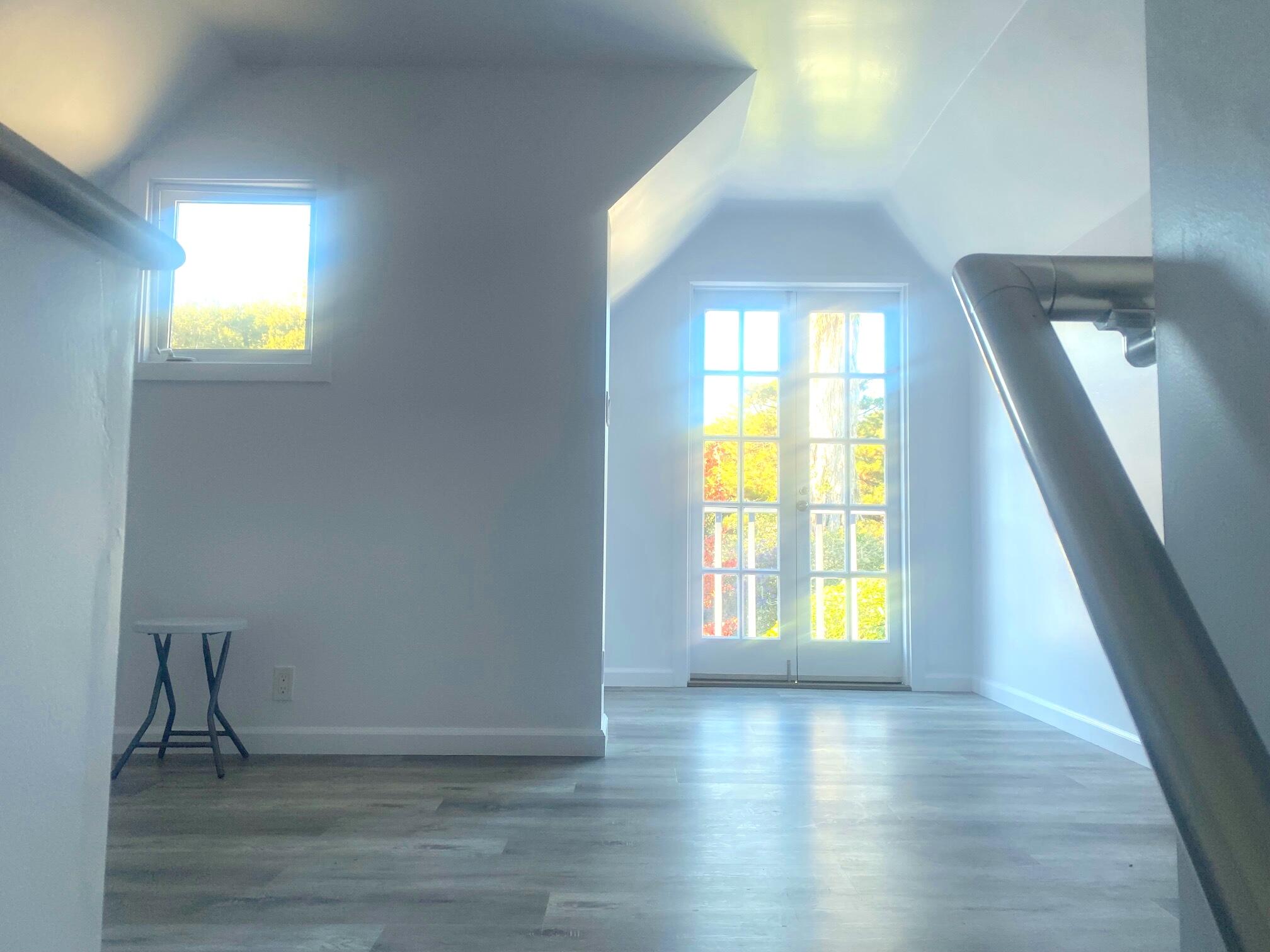 324 Arden Road Santa Barbara, CA 93105 - Photo 9 of 17 a view of empty room with wooden floor and fan