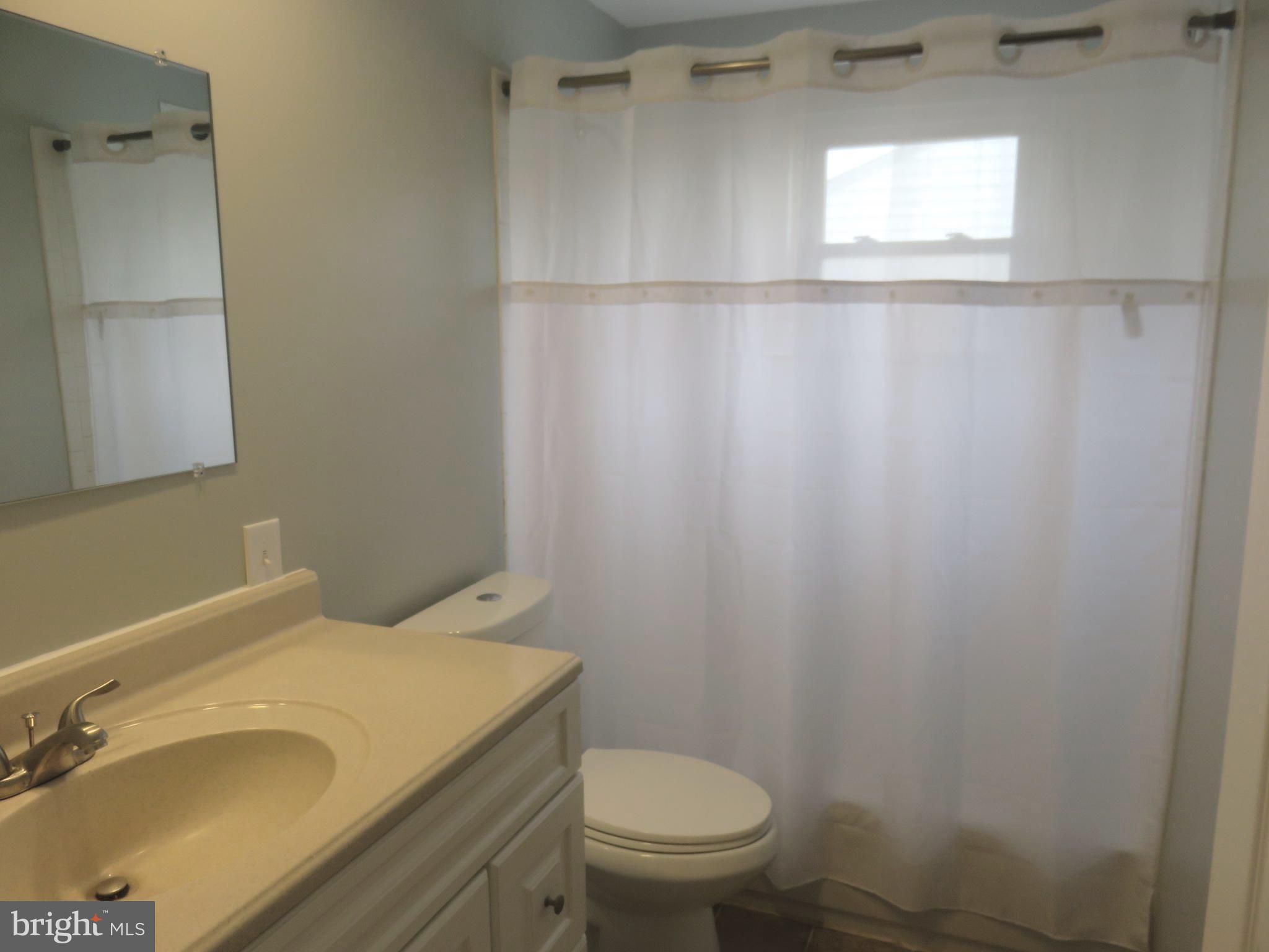 6840 Queens Ferry Road Baltimore, MD 21239 - Photo 20 of 28 UPSTAIRS BATH HAS BEEN UPDATED