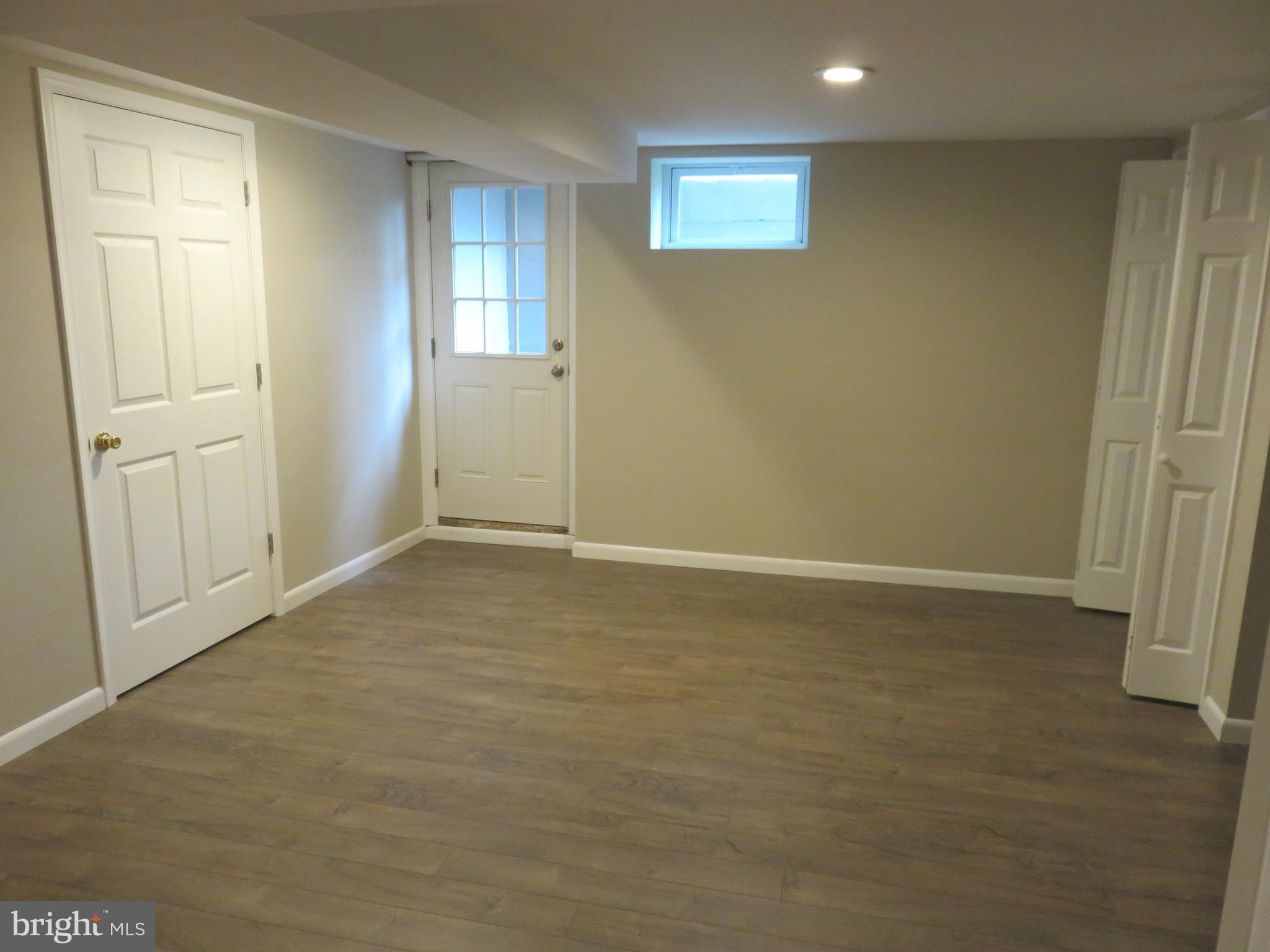 6840 Queens Ferry Road Baltimore, MD 21239 - Photo 23 of 28 OUTSIDE EXIT DOOR WITH STAIRS TO YARD