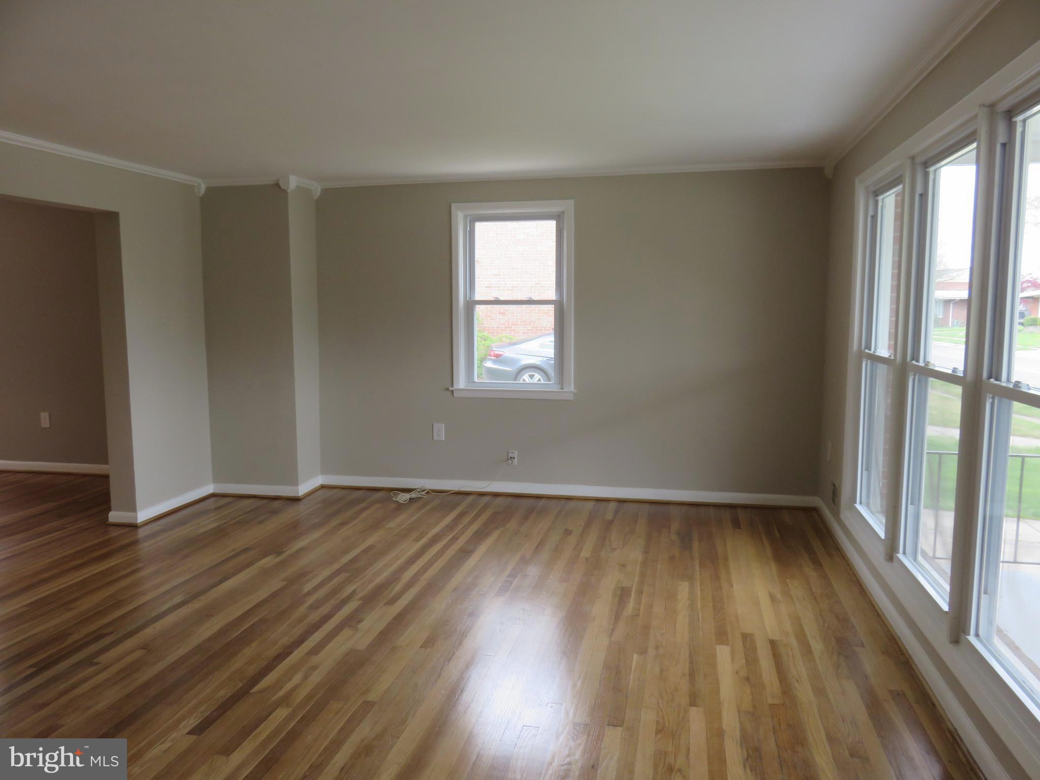6840 Queens Ferry Road Baltimore, MD 21239 - Photo 6 of 28 NATURALLY SUNLIT LIVING ROOM