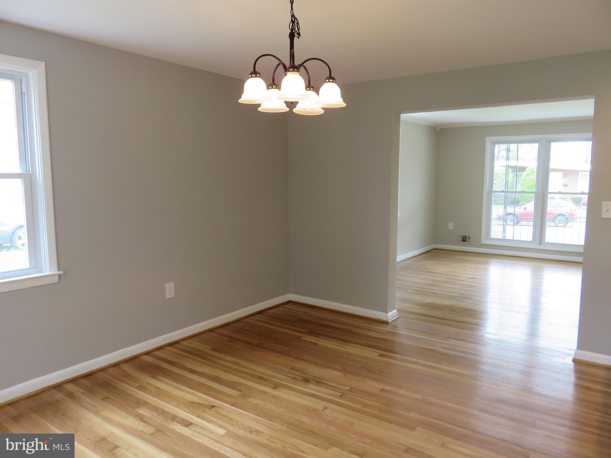 6840 Queens Ferry Road Baltimore, MD 21239 - Photo 8 of 28 DINING ROOM INTO LIVING ROOM