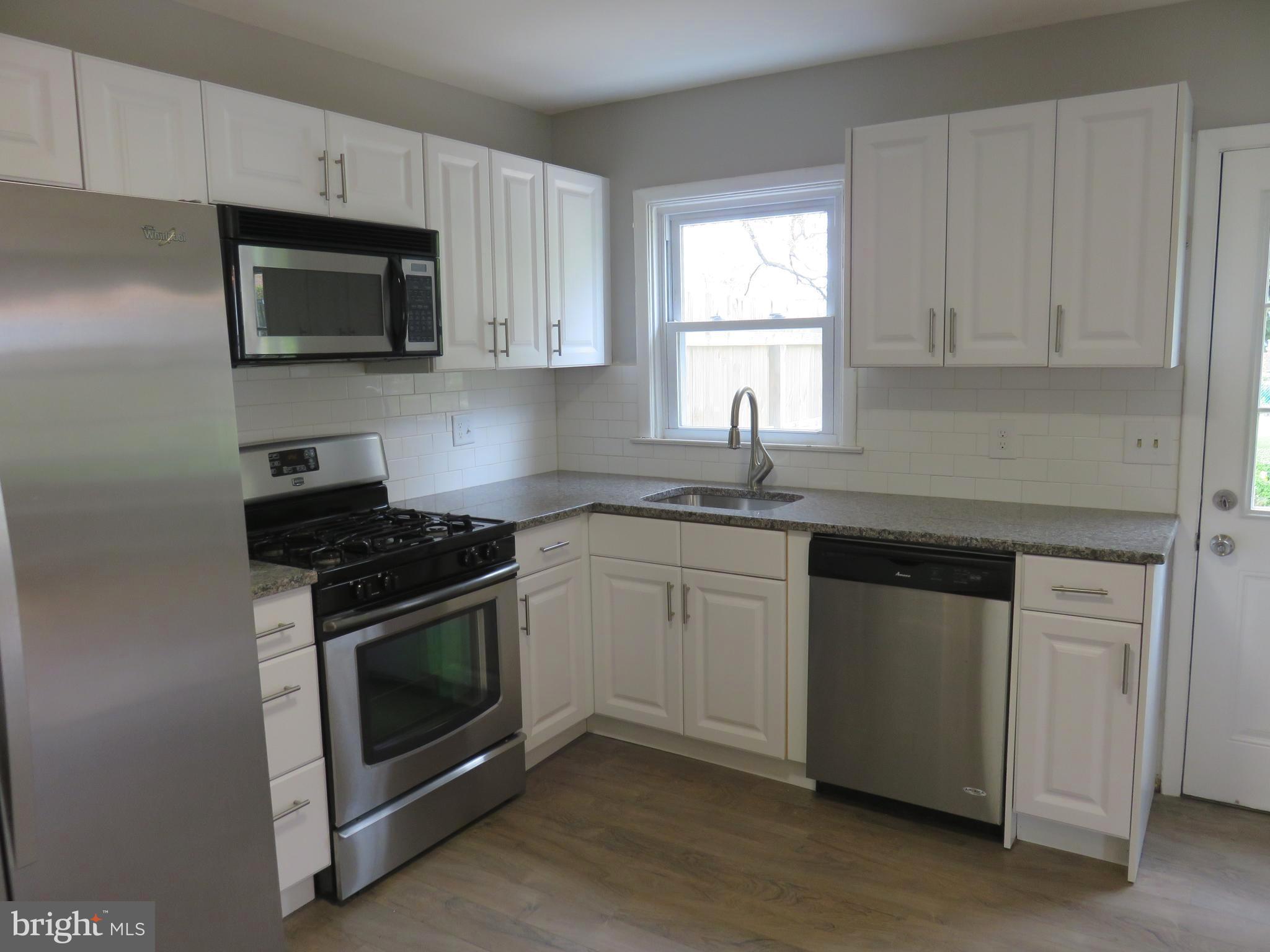 6840 Queens Ferry Road Baltimore, MD 21239 - Photo 9 of 28 TONS OF CABINETS & COUNTER SPACE
