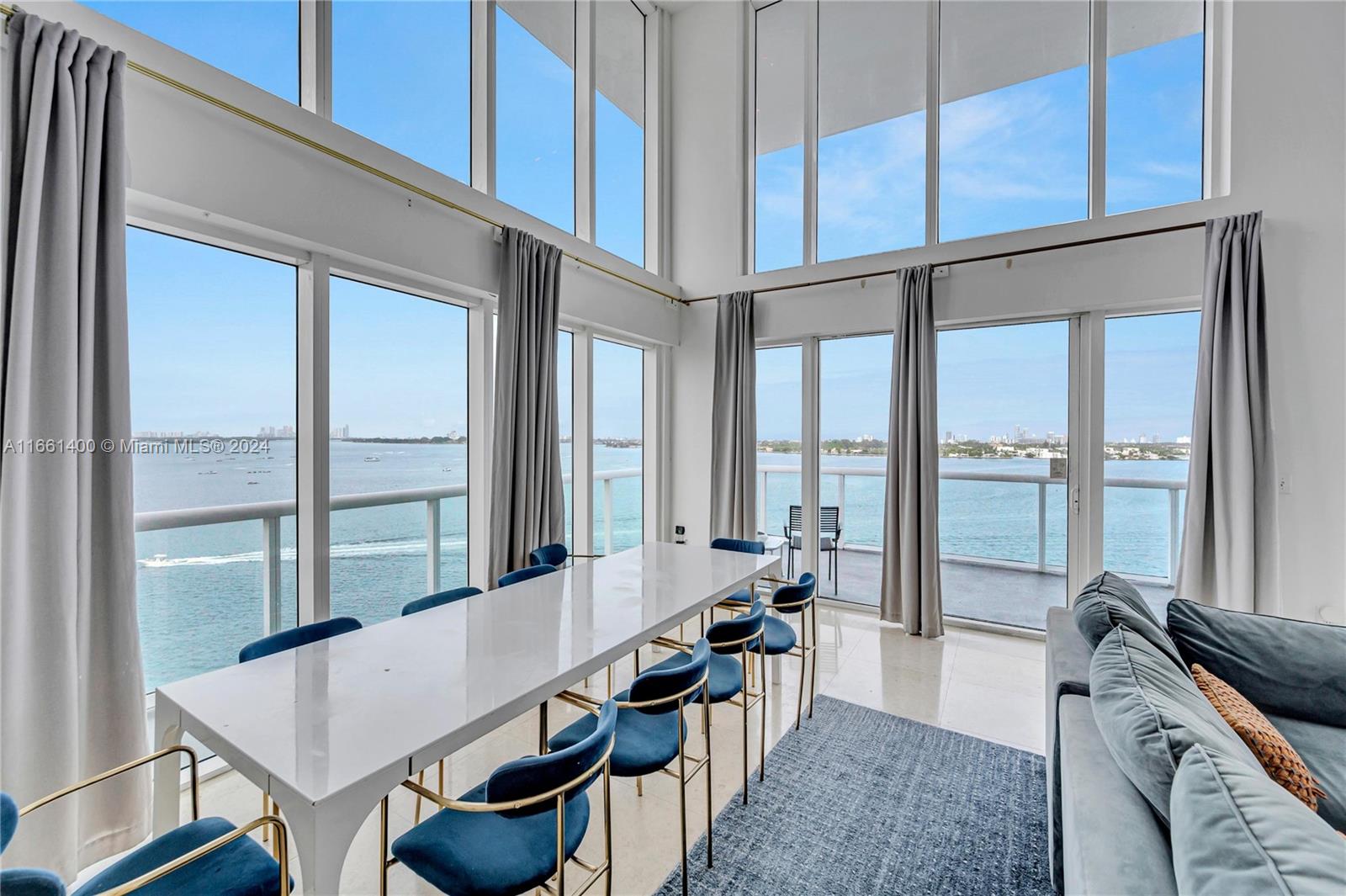7939 East Drive, Unit 13 North Bay Village, FL 33141 - Photo 2 of 31 a large living room with a large window