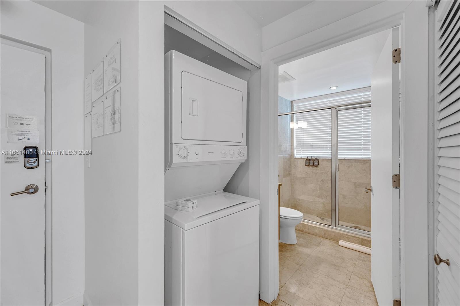 7939 East Drive, Unit 13 North Bay Village, FL 33141 - Photo 31 of 31 a view of bathroom with a toilet and a shower