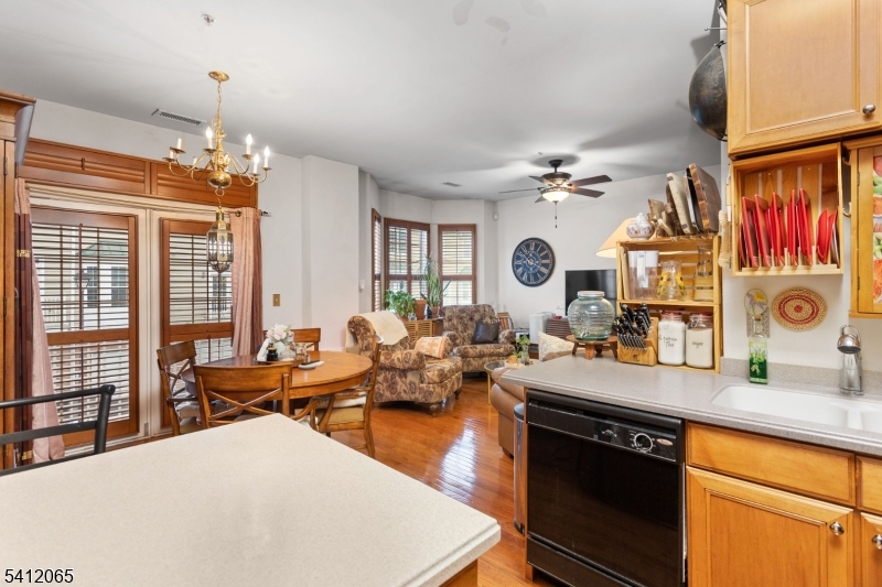 411 Deluca Road, Unit 411 Belleville, NJ 07109 - Photo 13 of 39 a group of people sitting in a living room