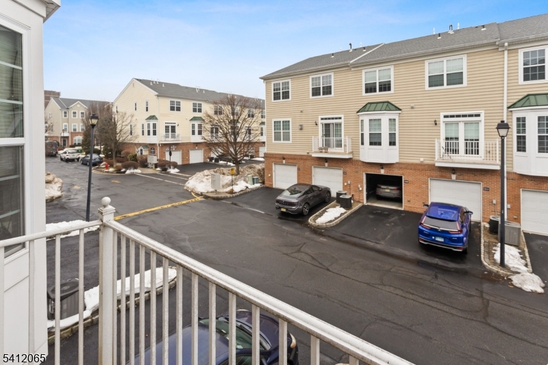 411 Deluca Road, Unit 411 Belleville, NJ 07109 - Photo 15 of 39 a view of a white building and outdoor space