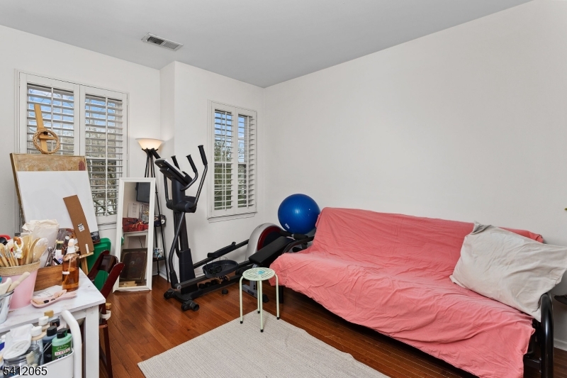 411 Deluca Road, Unit 411 Belleville, NJ 07109 - Photo 27 of 39 a bedroom with furniture and a window