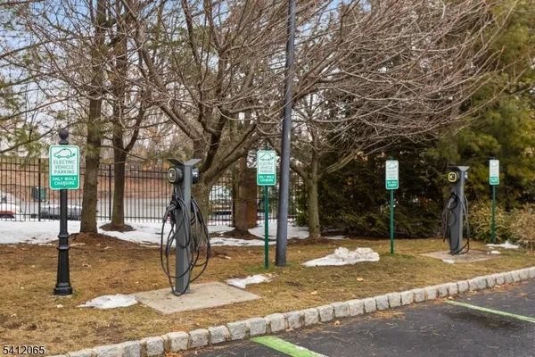 a view of a playground with basketball court