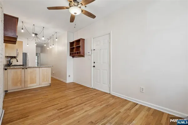 a view of a livingroom with a flat screen tv